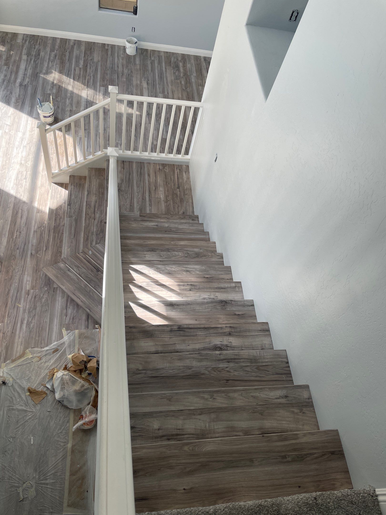 Laminate Staircase and Flooring  by Footprints Floors of Chandler 