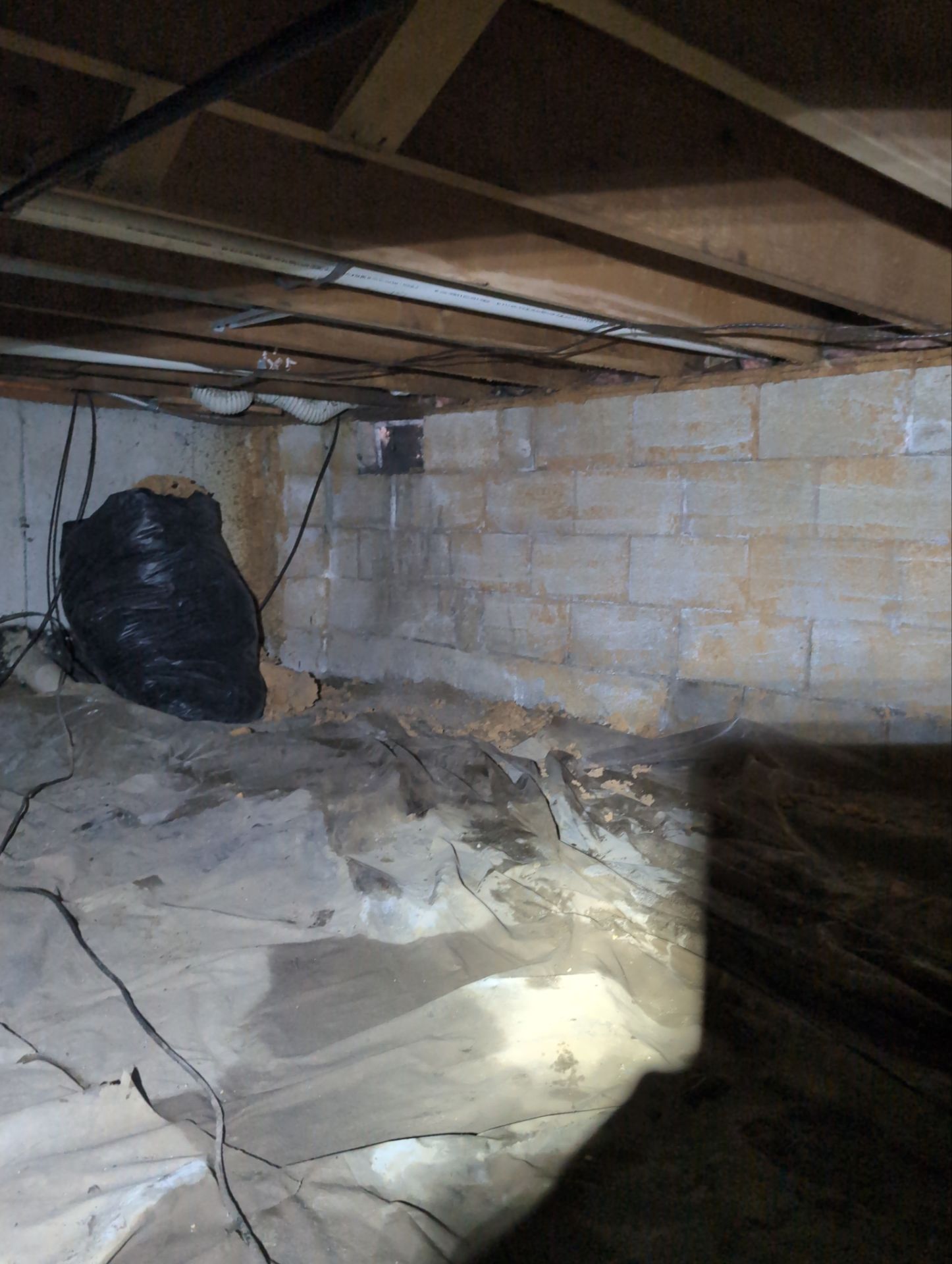 Interior Basement Waterproofing System and Egress Window Installation by Toledo Basement Repair 