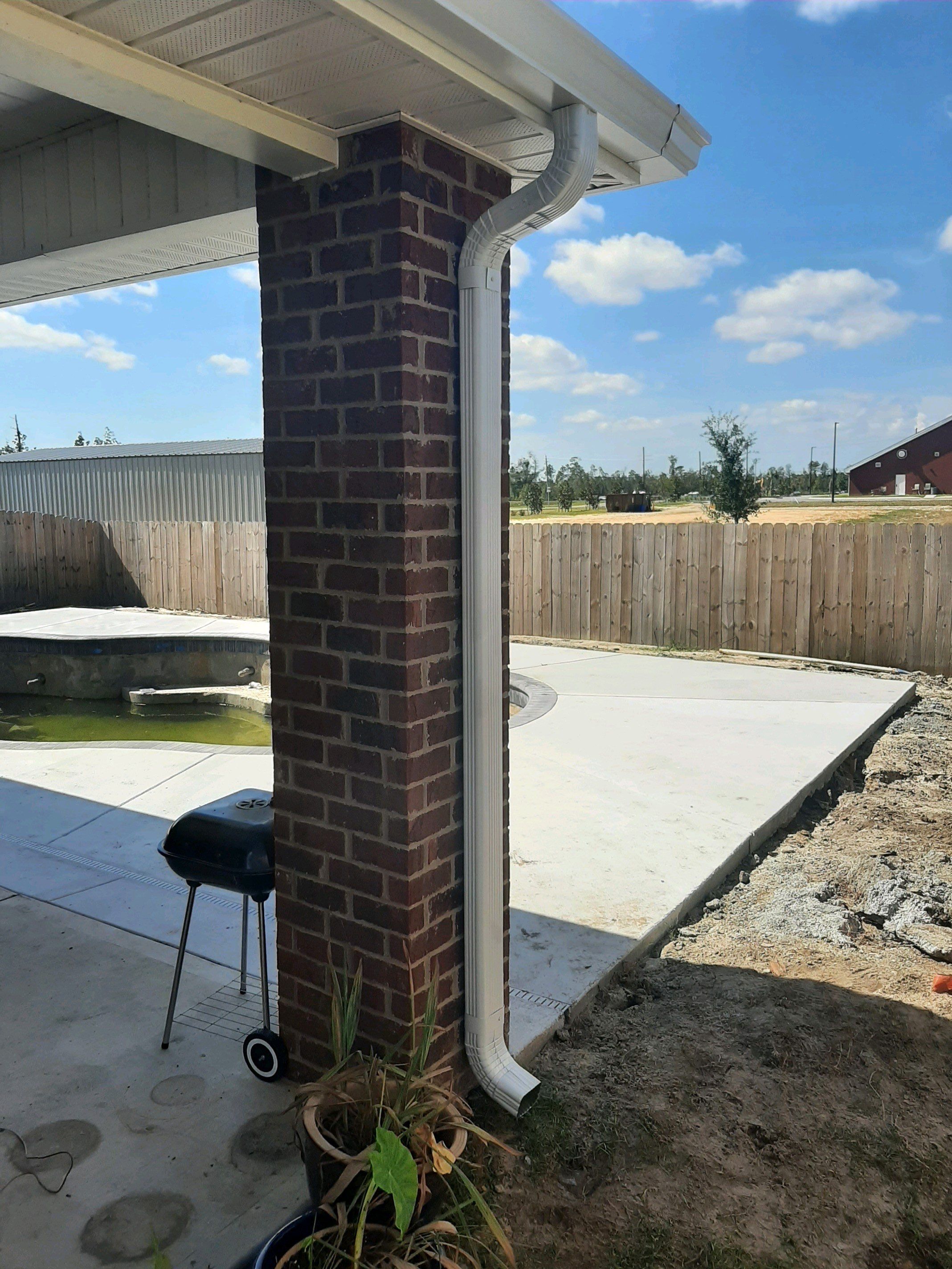 Seamless Gutter Installation using White K-Style Gutters by Gutter Professors