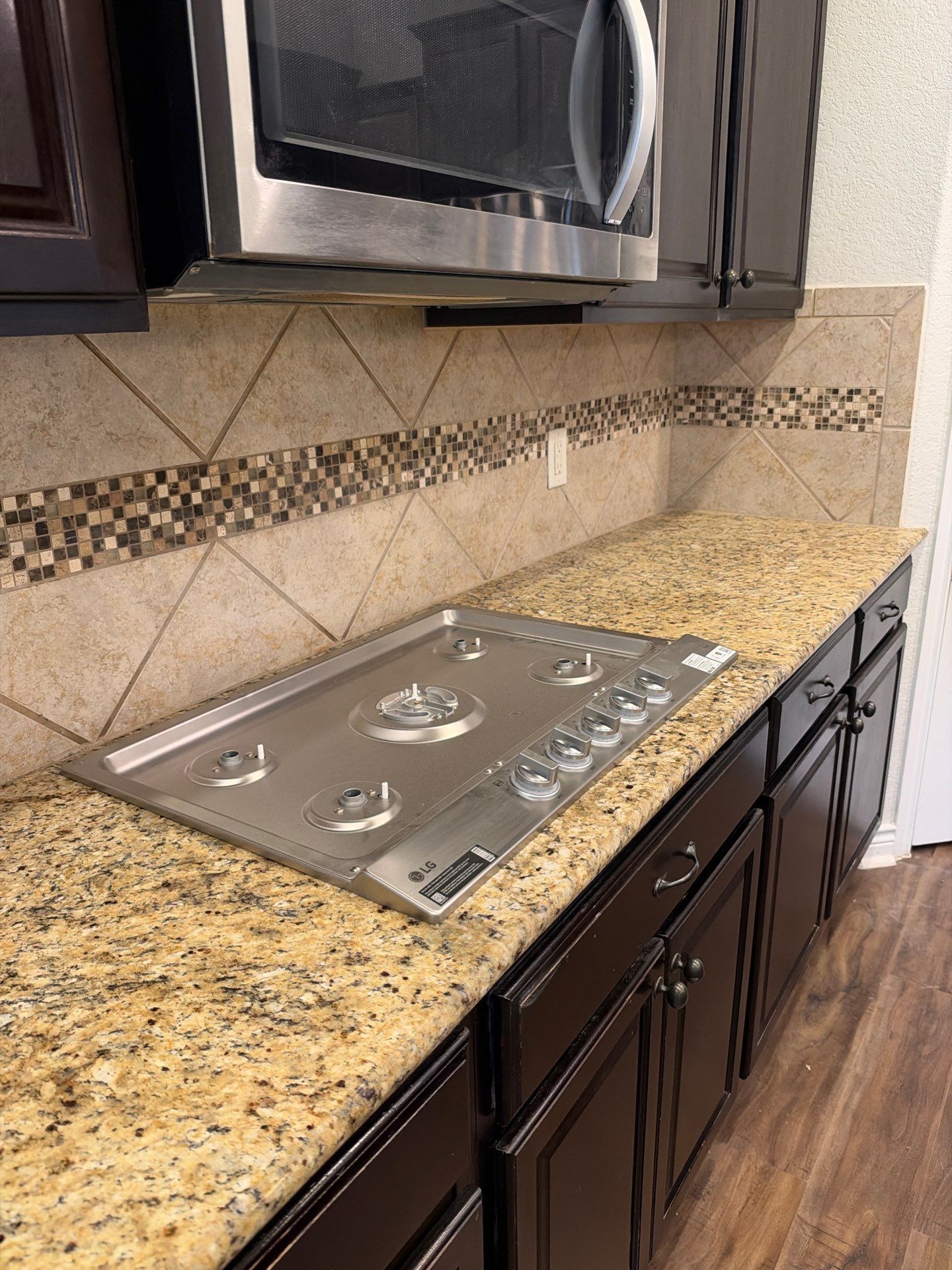 Granite Countertop and Custom Tile Backsplash Installation in Helotes by Mena stone surfaces