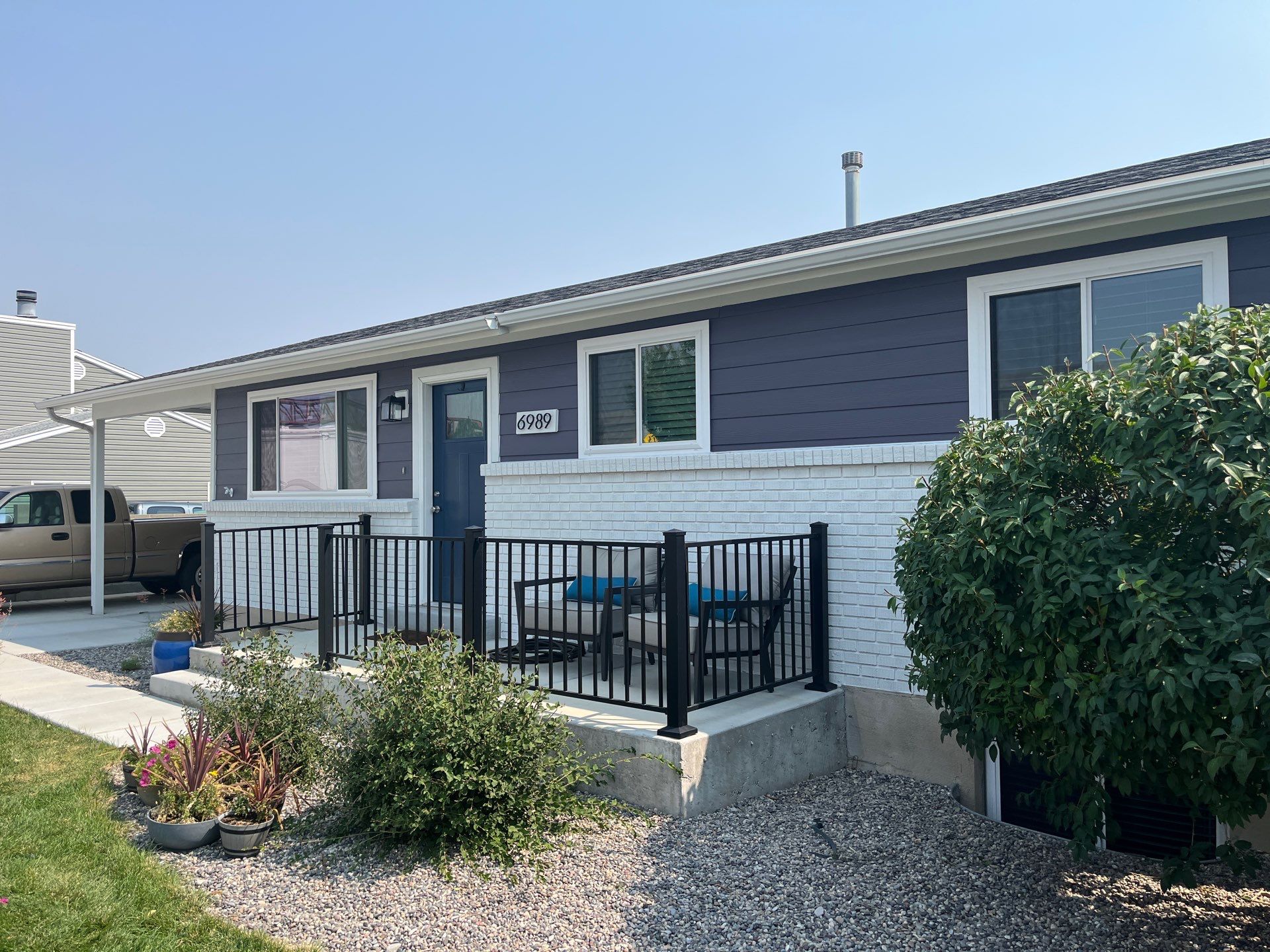 West Jordan | Custom Painted Hardie Upgrade | SW Midnight & Arctic White by Ideal Siding Utah