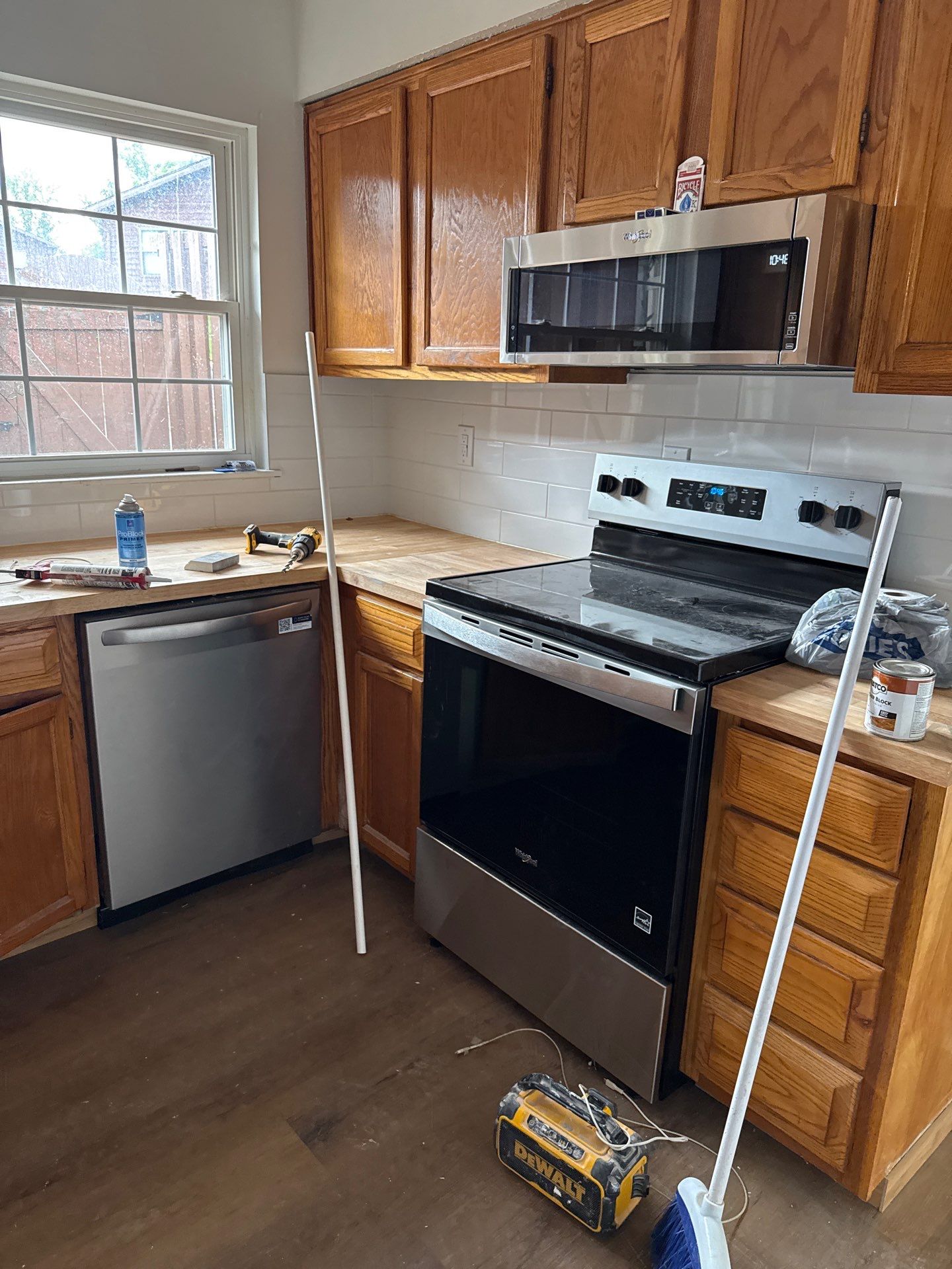 Complete Home Remodel Featuring Custom Kitchen and Wood-Look Plank Flooring by MAJO