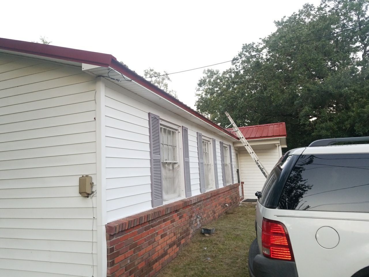 Residential Roofing Installation using Metal roofing by American Roofing & Construction LLC