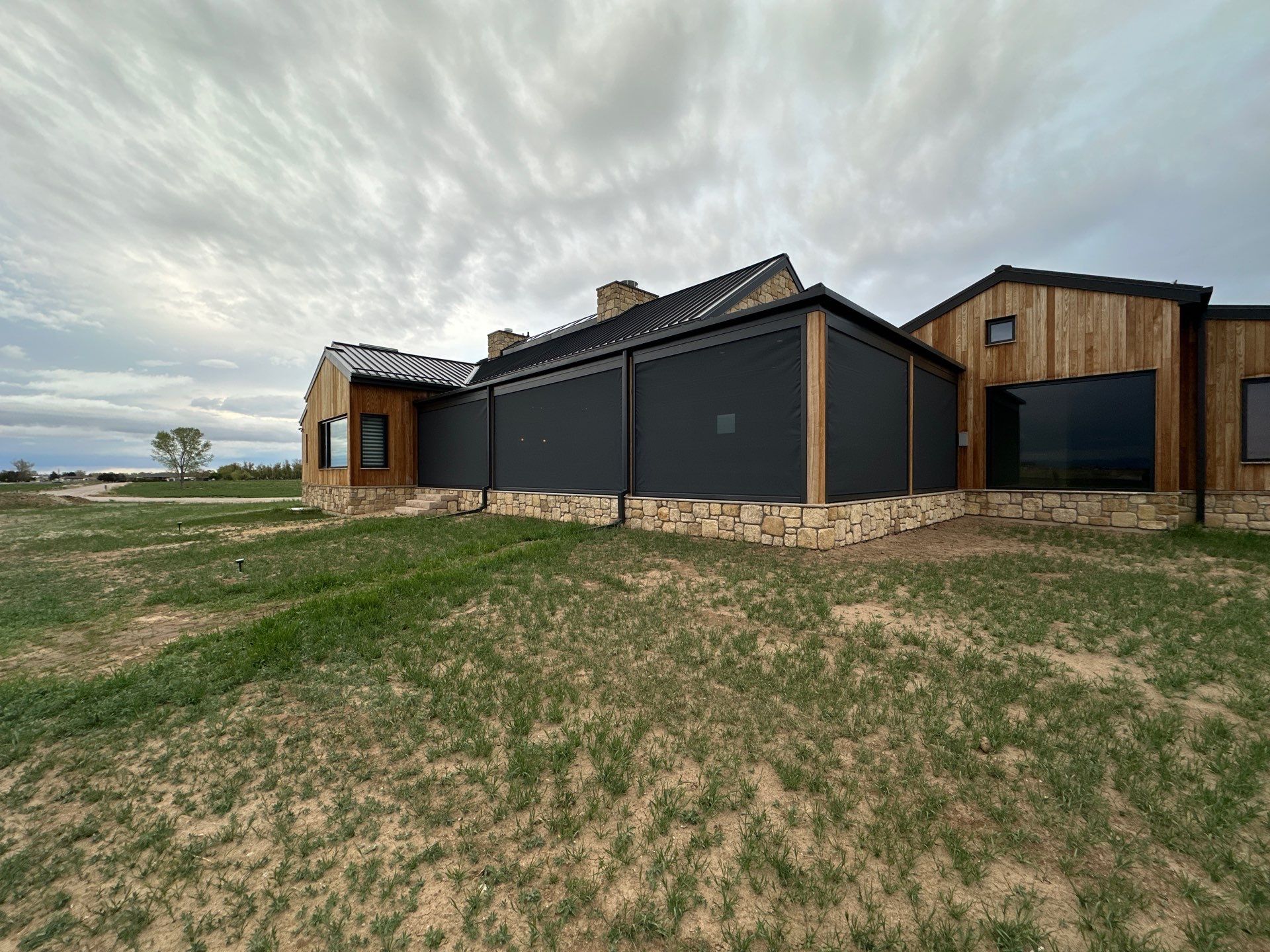 Motorized Screens using Progressive MagnaTrack Screens by Outdoor Solutions Colorado
