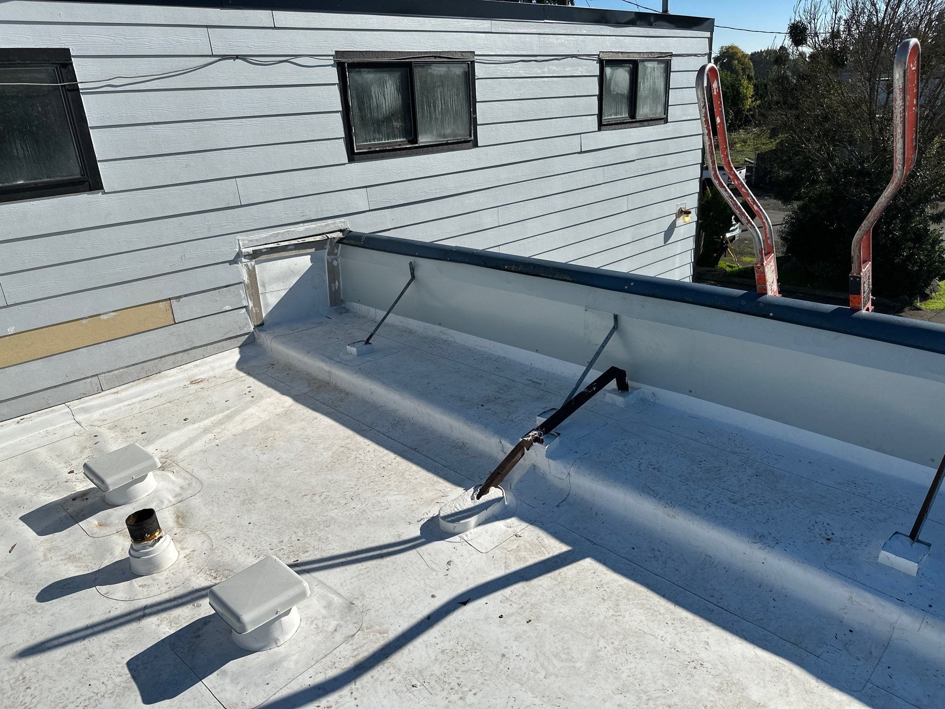 Commercial Roofing Installation using GAF 60Mil TPO  by Orezona Building & Roofing Company, Inc.