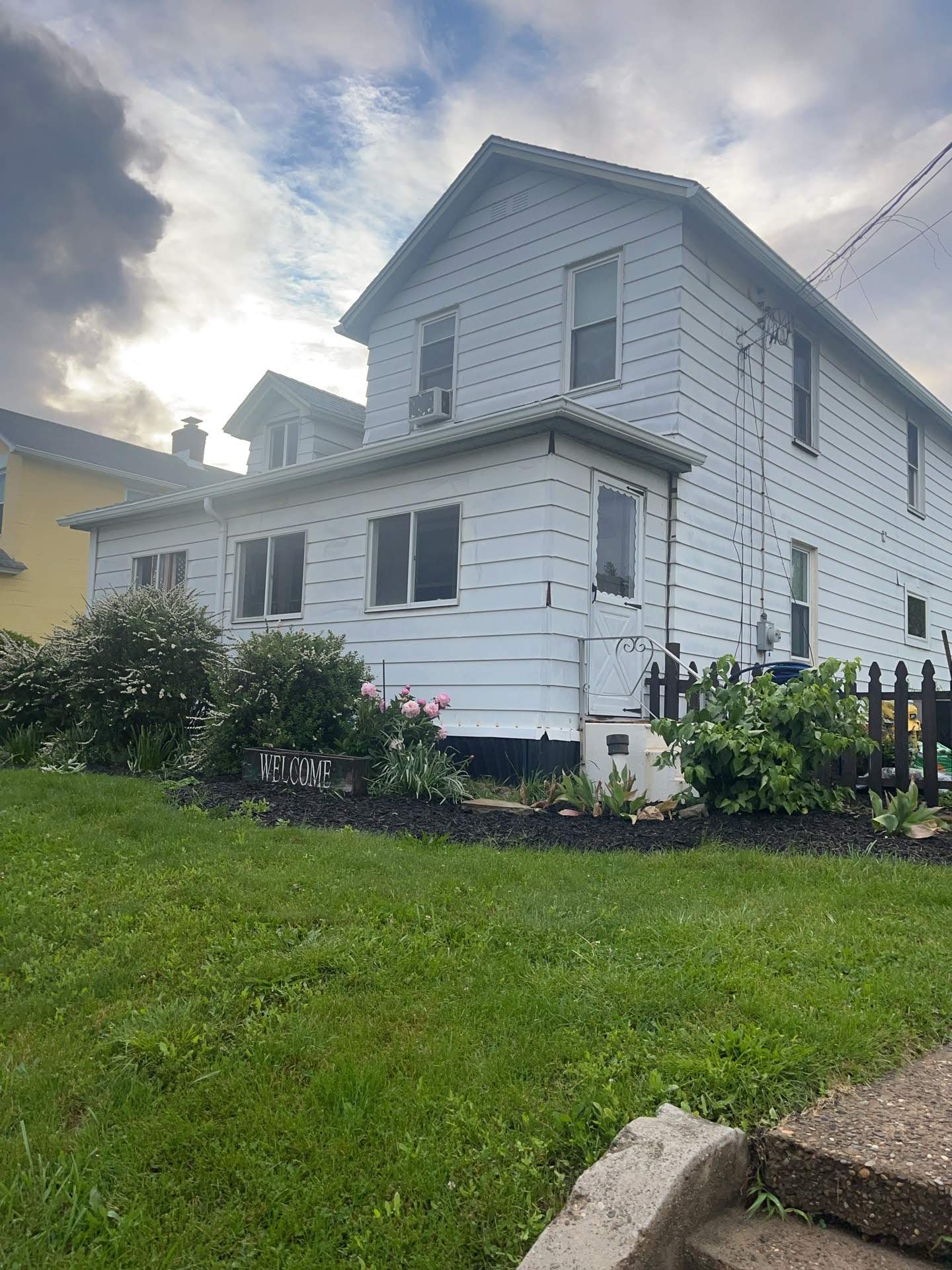House Siding Renovation with White Vinyl in Bridgeville by Ideal Siding Pittsburgh