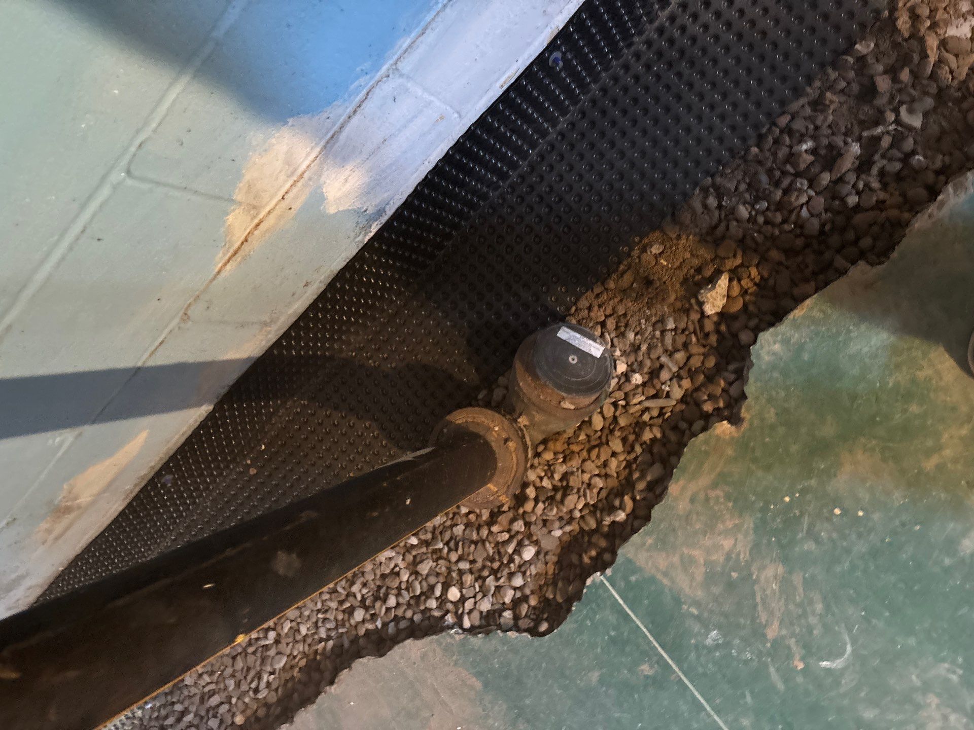 Completing the Connection for Lisa's Drain Tile System by Waterproofing Northeast