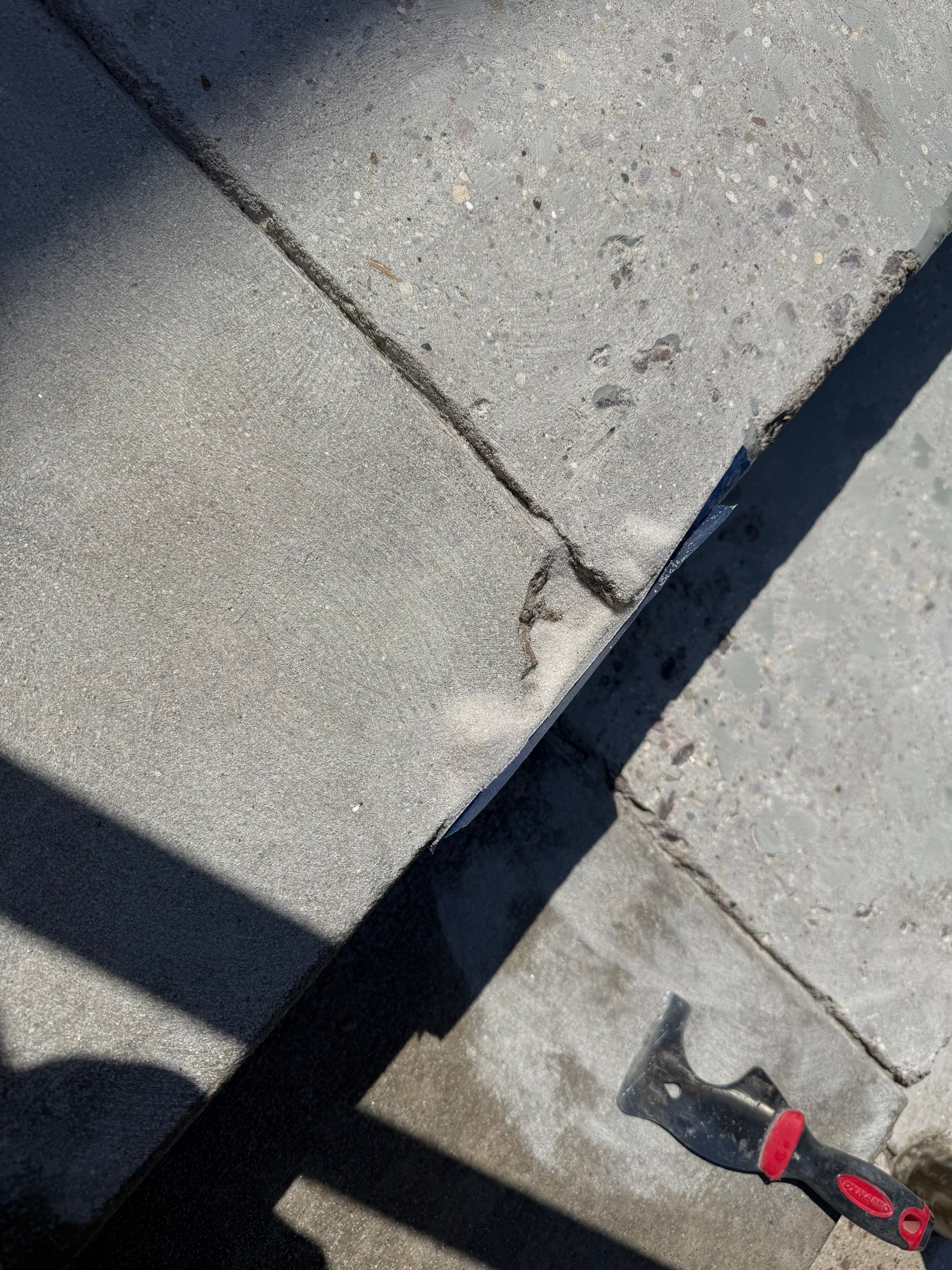 Concrete Stair Repair and Protective Coating in Sioux Falls by Select Painting, Coatings & Garage Cabinets
