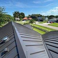 24ga 1.5" Mechanical Seam Dark Bronze by Total Roofing System The Metal Roof Experts
