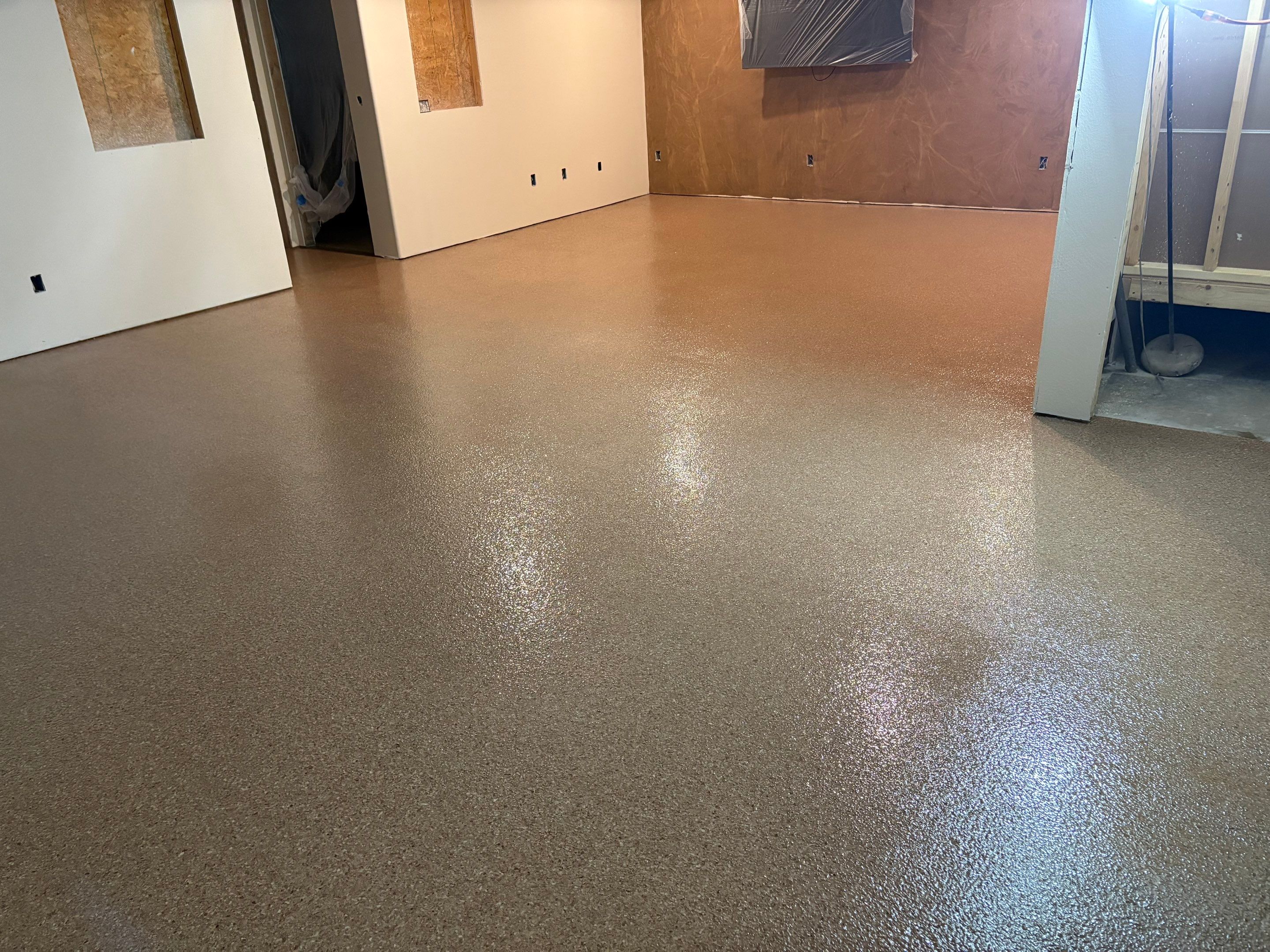 Custom Chip Concrete Coating for Colman Basement and Garage by Select Painting, Coatings & Garage Cabinets