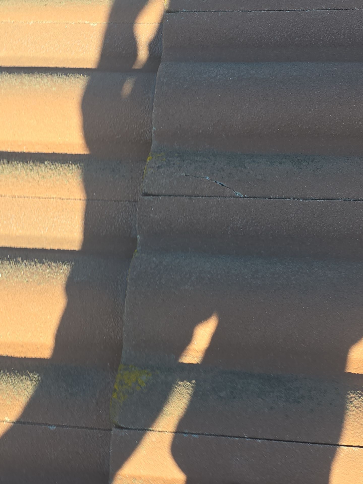 Tile Roof repair by Grandmark Service Company