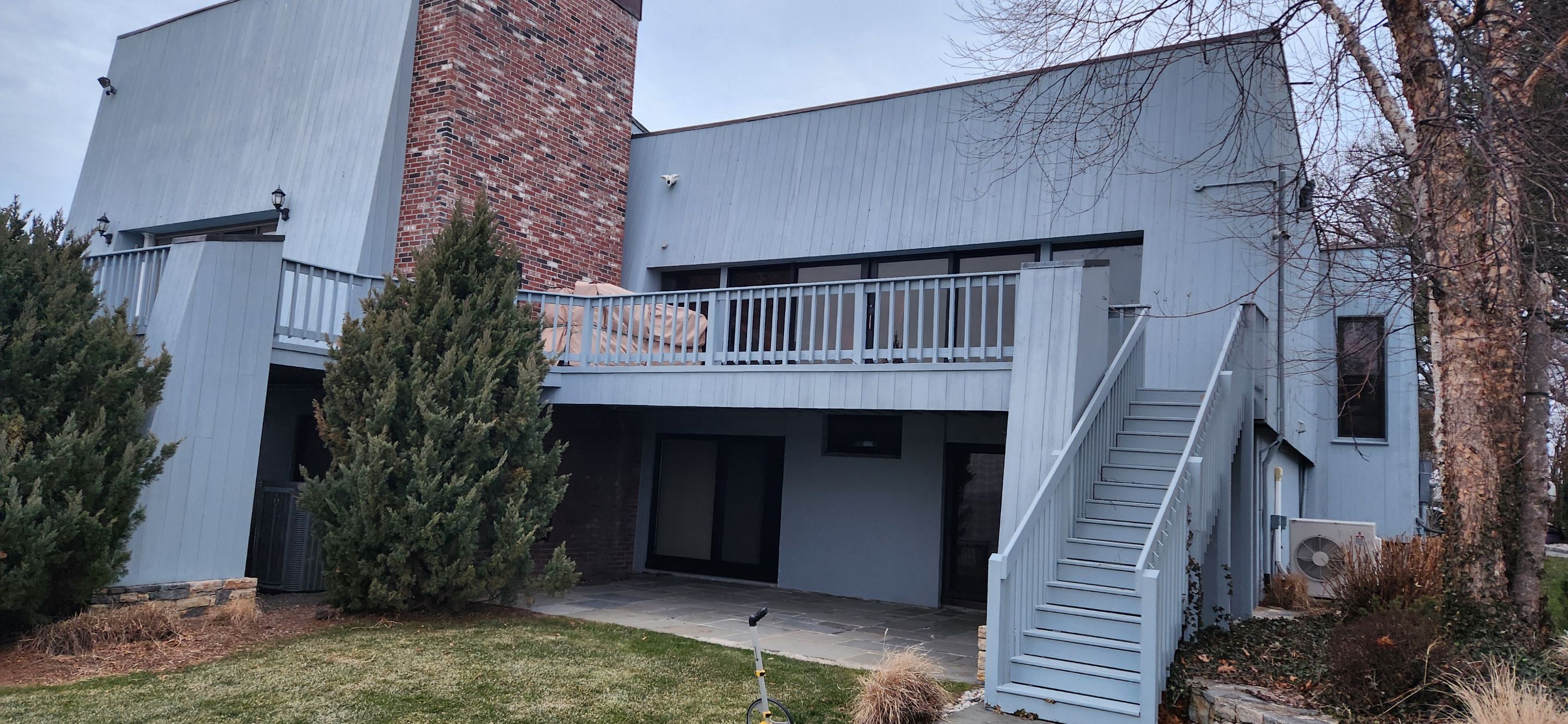 Siding Renewal with Cert S/7 Reverse Board & Batten, Midnight Blue by DiGiorgi Roofing and Siding Inc