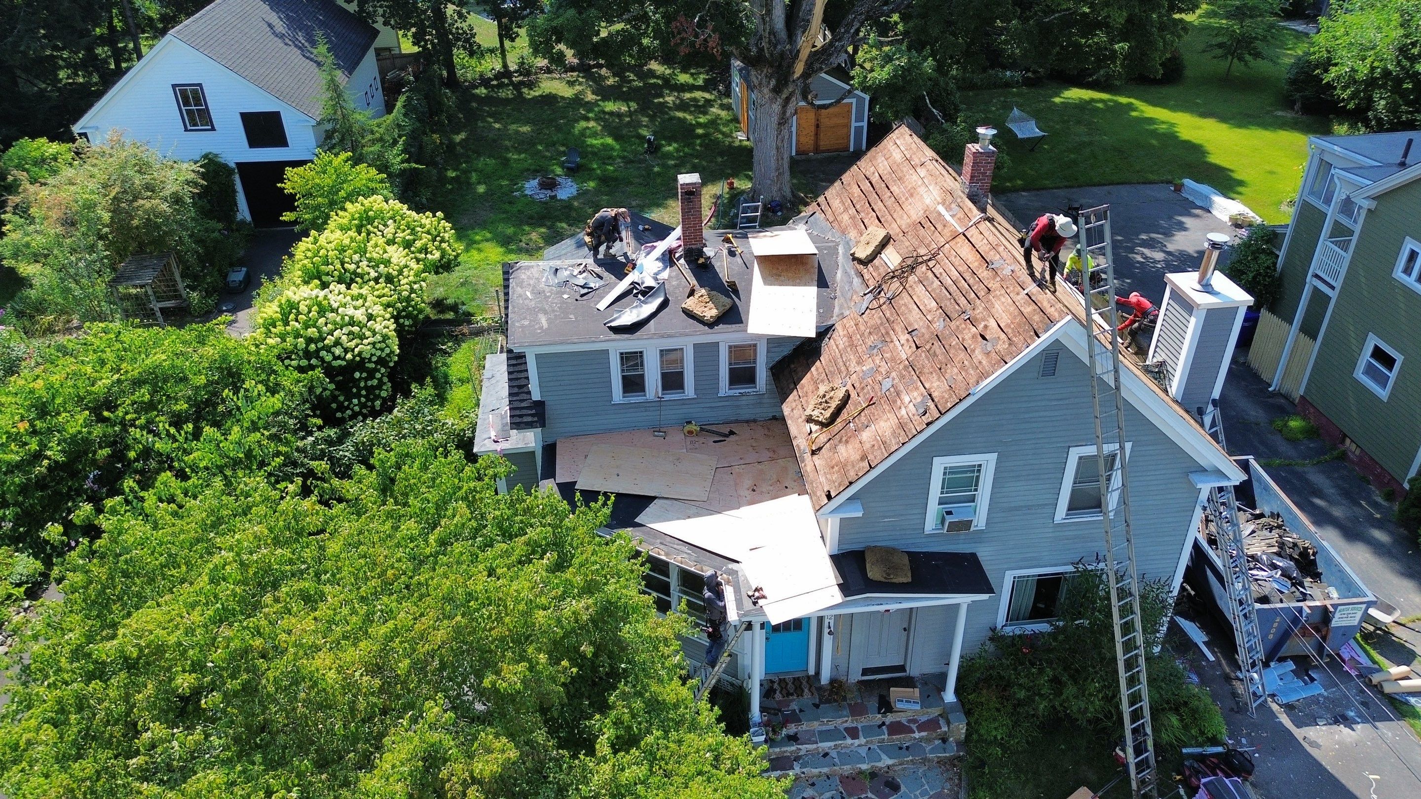 Full Roof Replacement + Custom Gutter Install | Onyx Black Finish by Mighty Dog Roofing of Greater Middlesex County