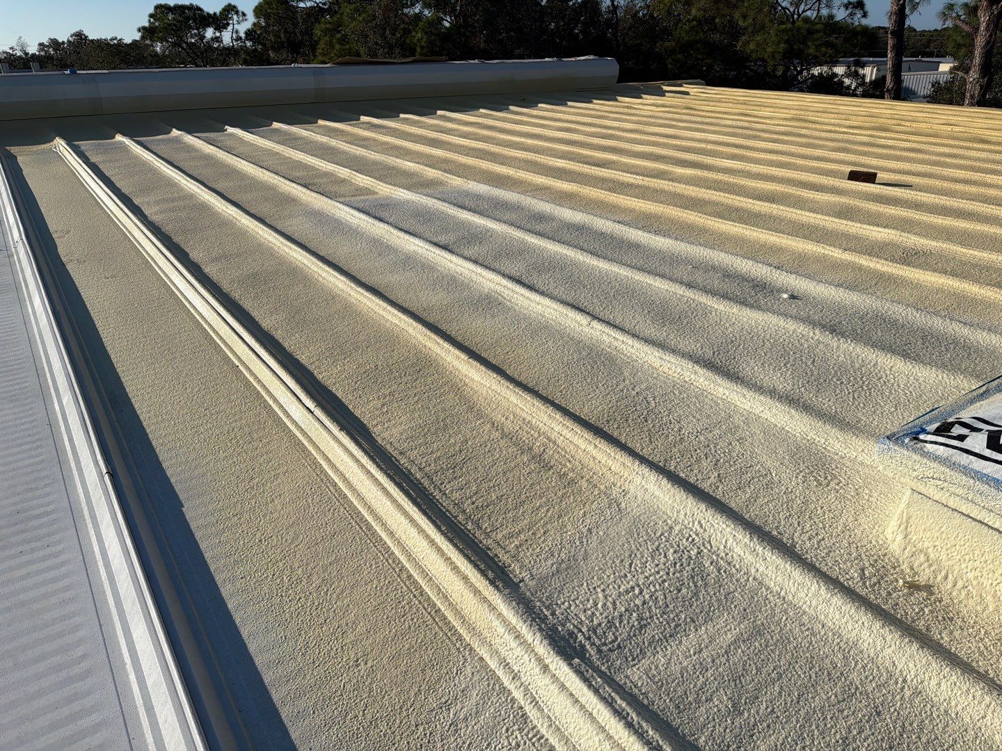 Sarasota Industrial Warehouse Metal Roof Silicone Coating Restoration by CES Roofing