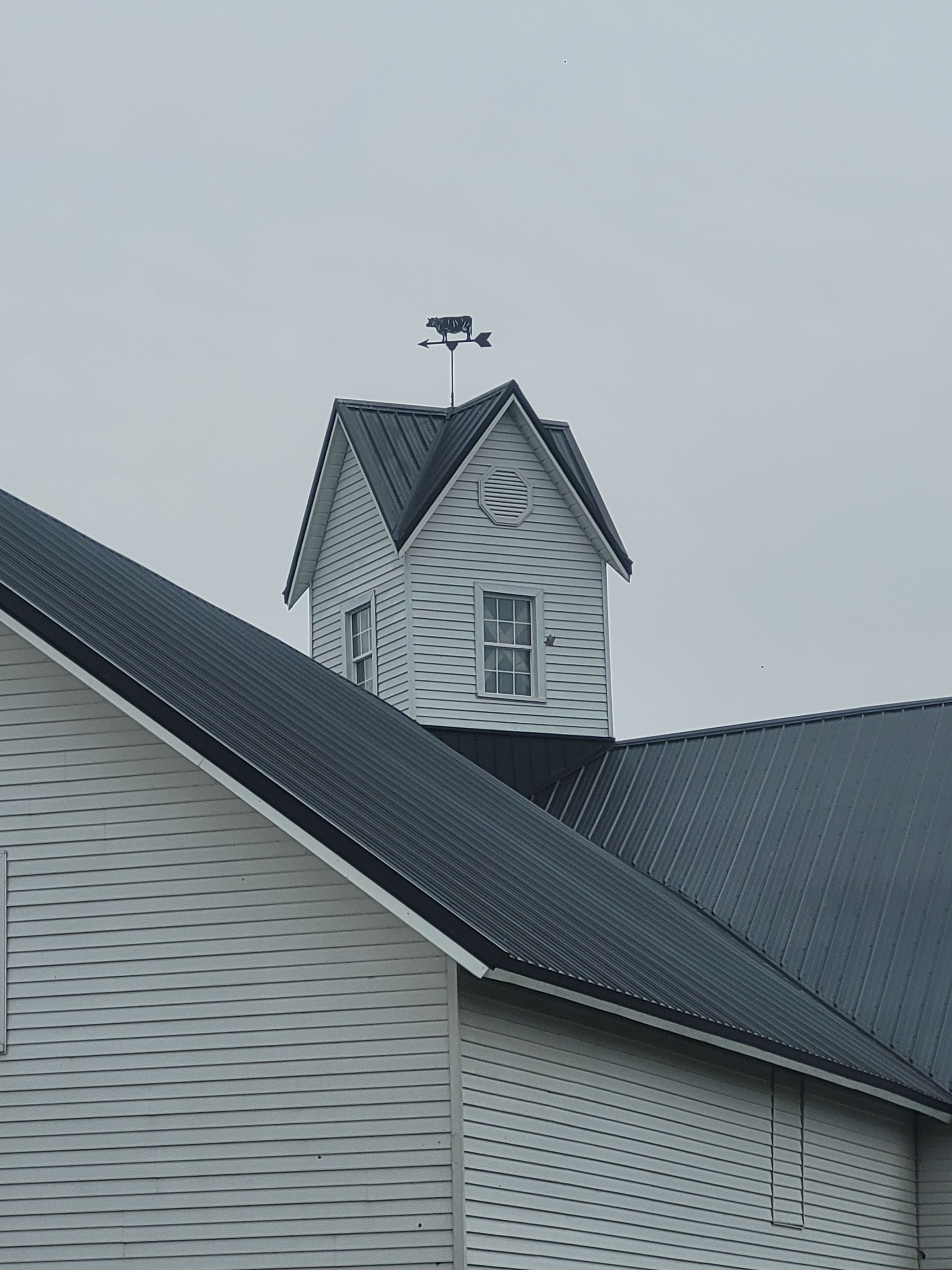 New metal roof on heirloom barn by Dagny Builders