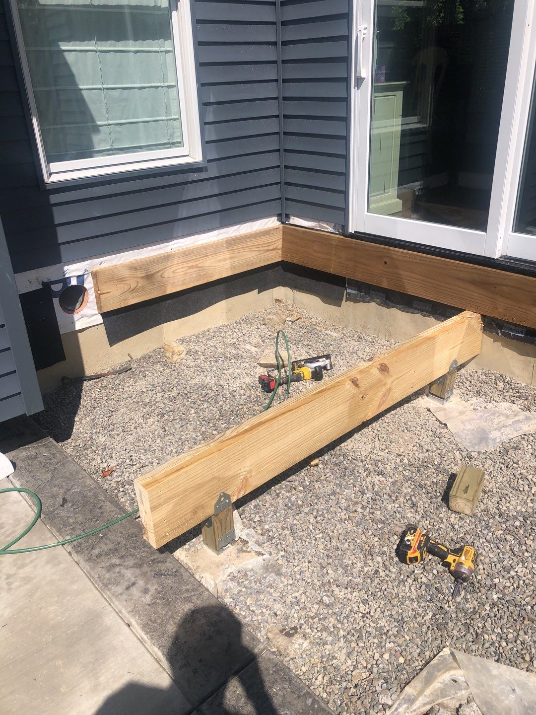 Outdoor Living- Deck and Concrete by Ivy Lea Construction
