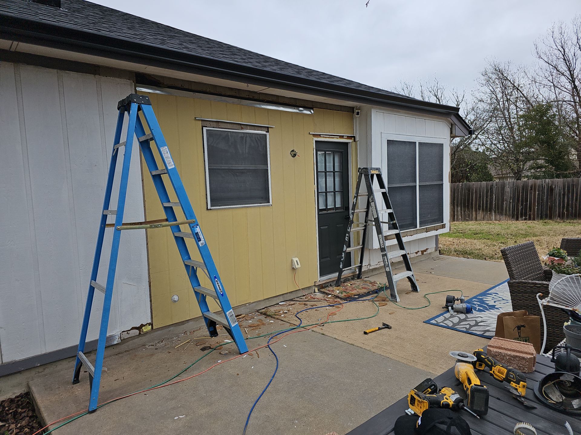 Siding Repair - Gutters - Roof Installation IKO Dynasty Granite Black by DeZign Roofing & Exteriors