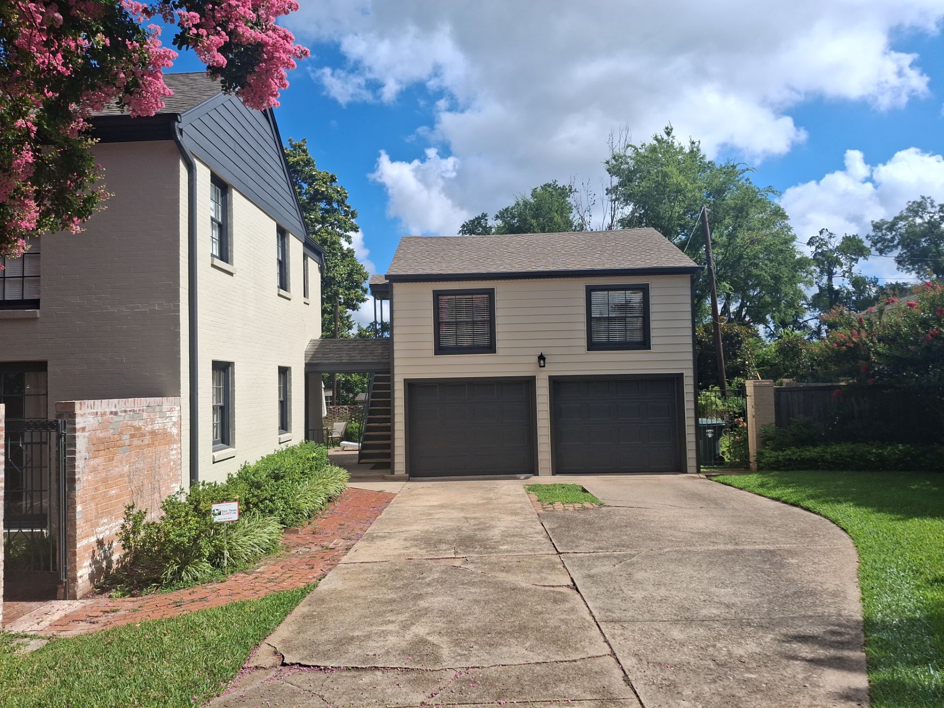 Exterior Painting in Tyler, TX | White Brick Home with Sherwin-Williams Duration by Quality Coats Painting