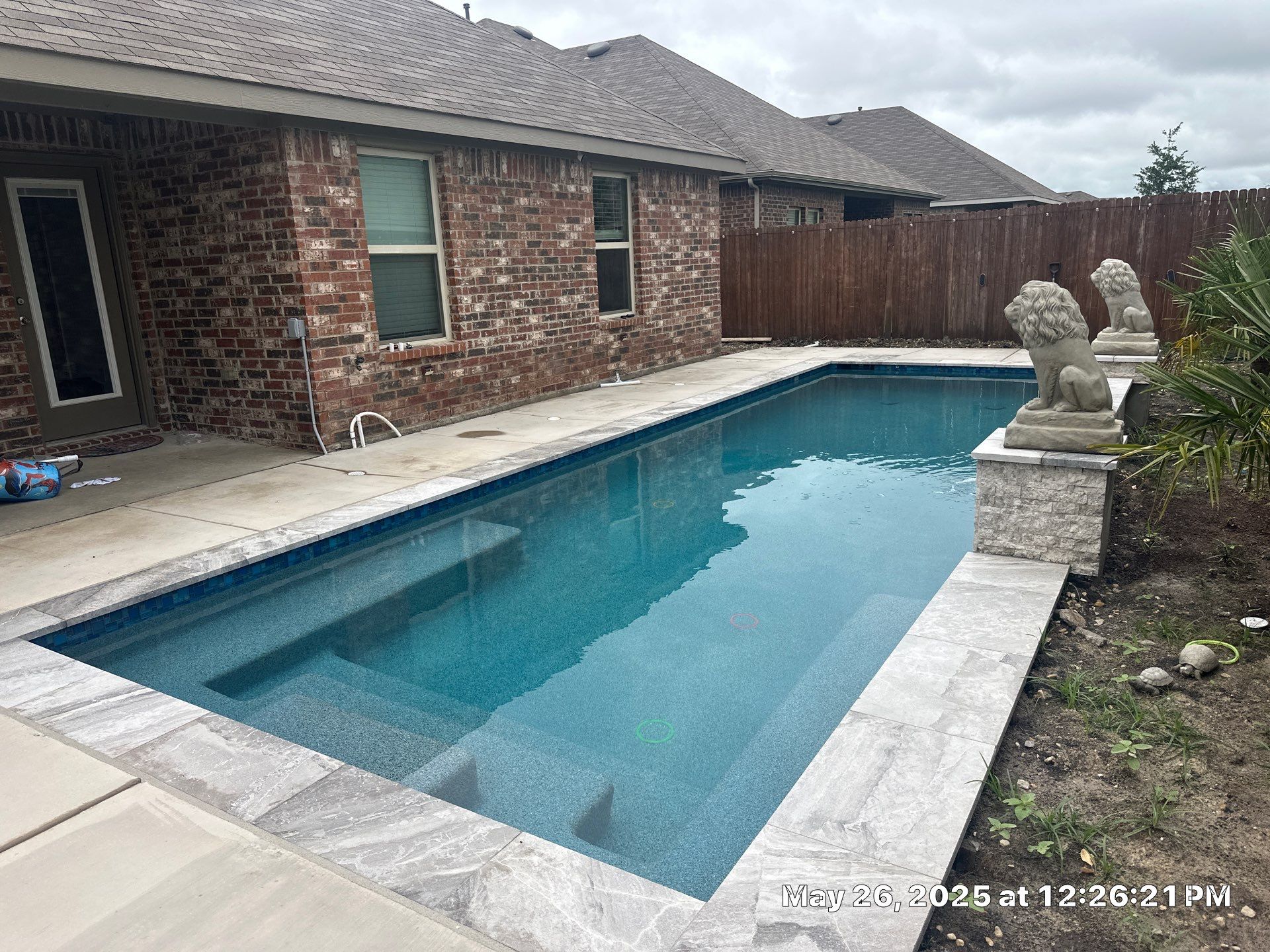 Geometric Pool with Raised Fountain Wall by Pinnacle Pools and Spas - DFW