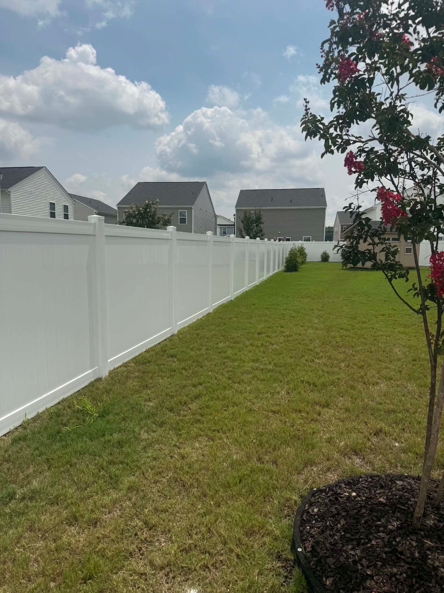 Vinyl Privacy Fence Installation for Greenville Residence by Superior Fence and Rail