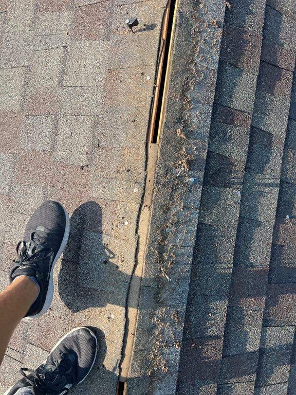 Residential Roofing Repair using Ridge vent replacement by Nitro Roofing and Construction