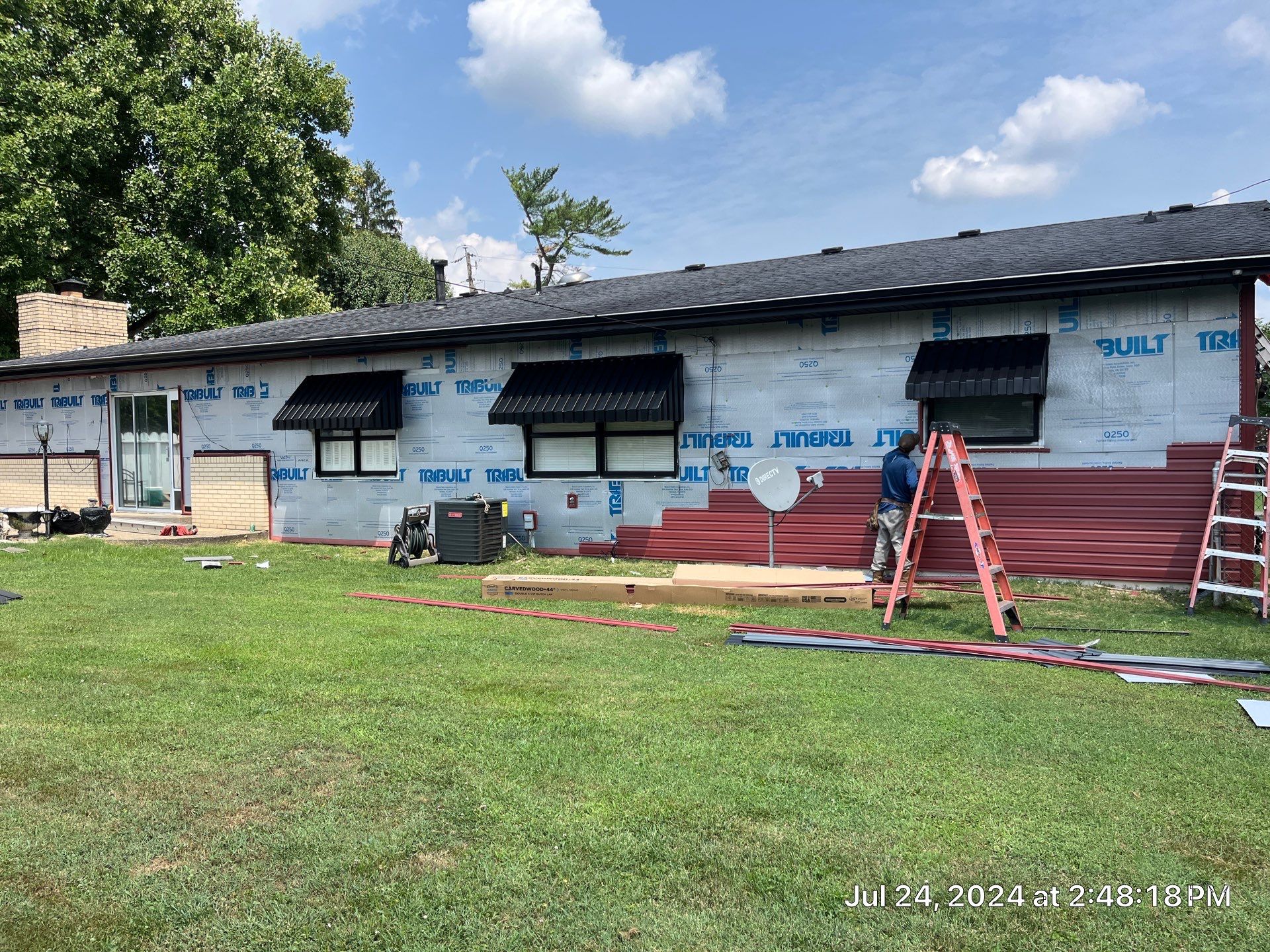 Siding Installation using Mastic Plygem Carvedwood by Fahey Roofing + Contracting