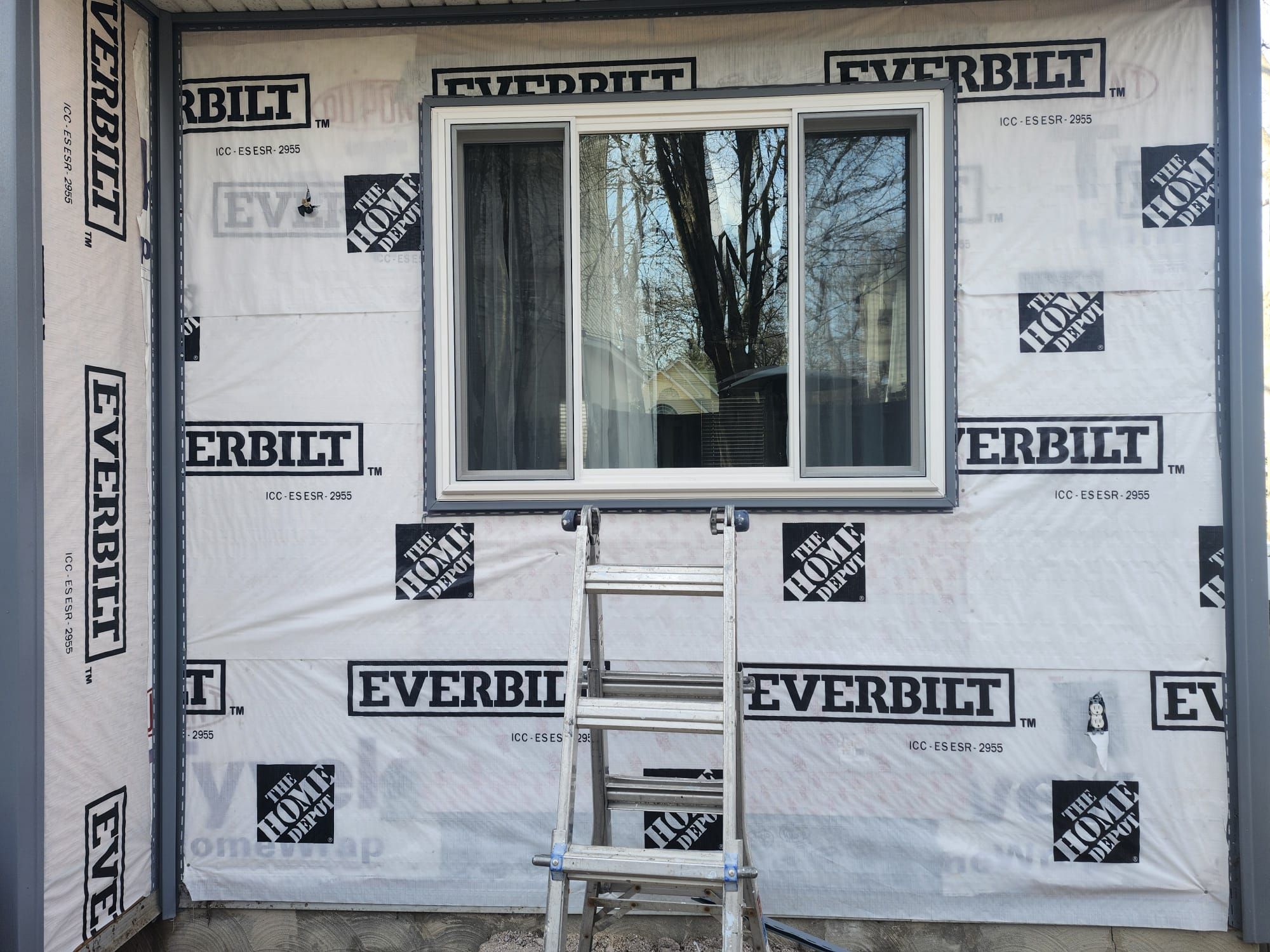 Provia 3 part slider in place of an entry door by Window Depot of Annapolis