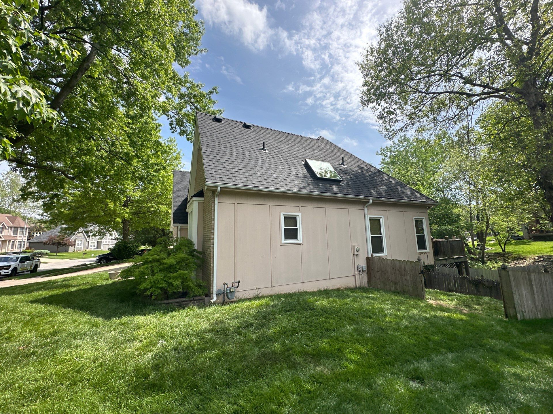 Comprehensive Roof Replacement and Skylight Installation in Kansas City by Liberty Roofing