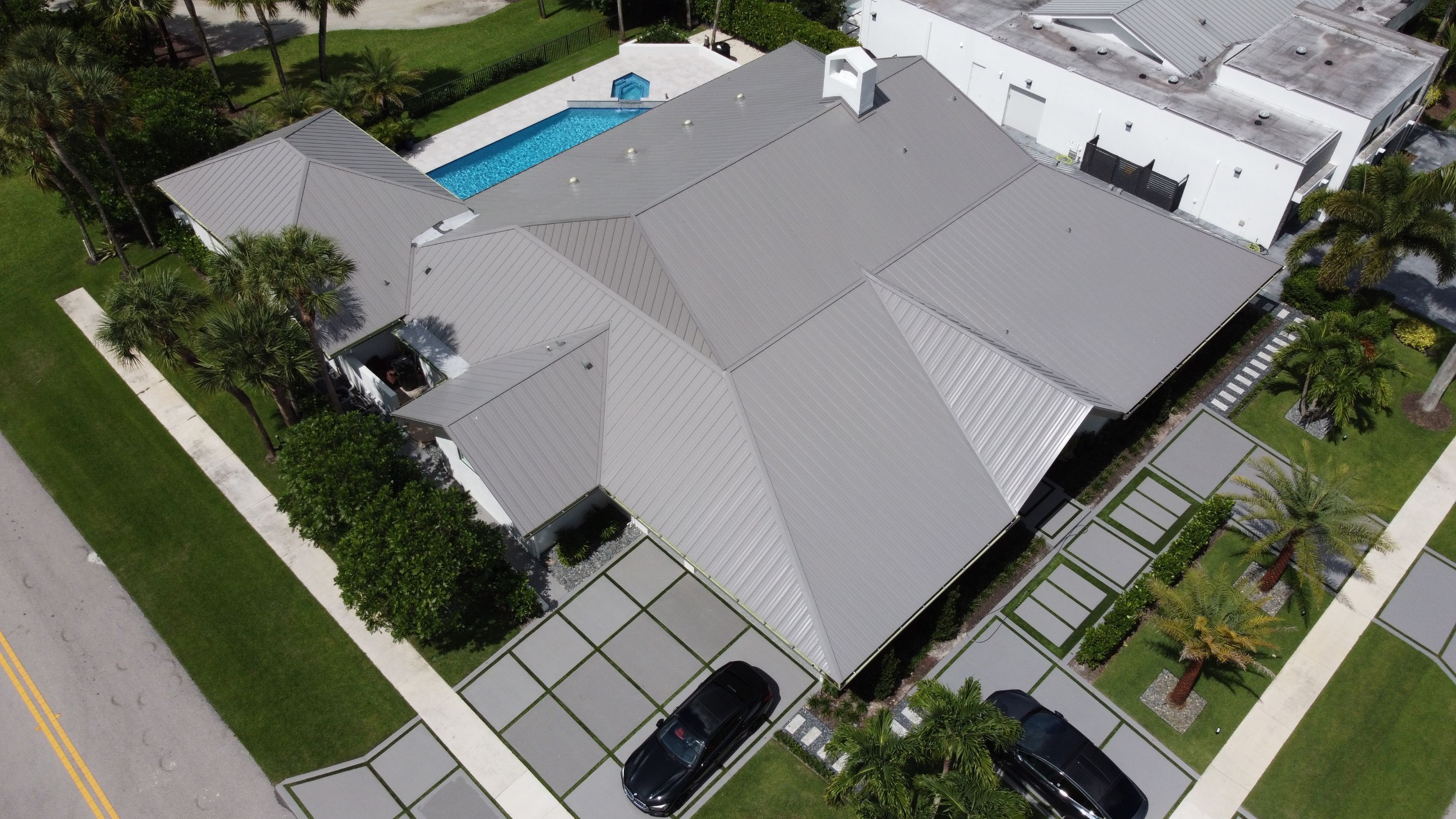 Residential Roofing Installation using 1" Nail strip metal roof by BLUES BROTHERS CONSTRUCTION CORP