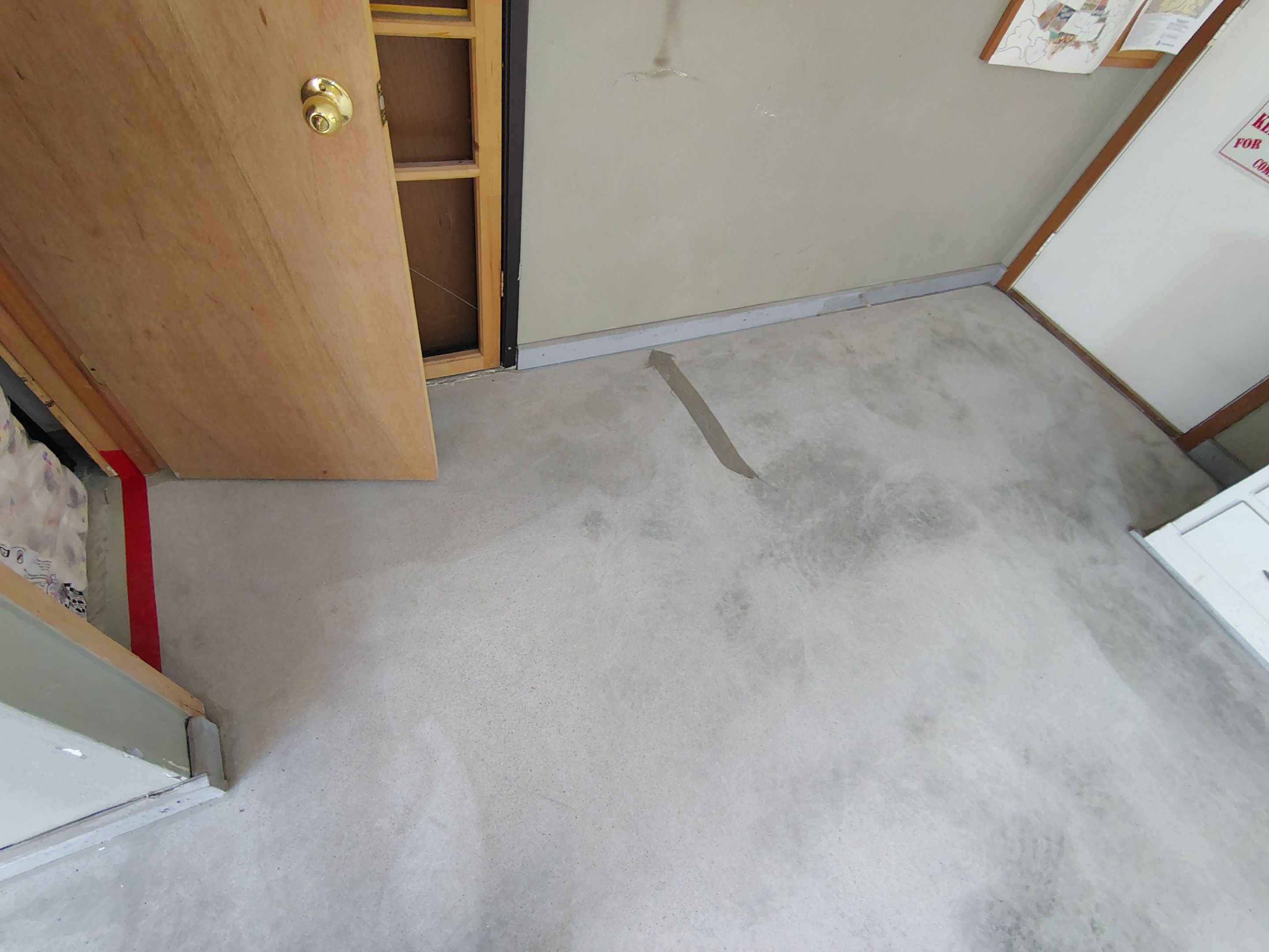 Domino Flake Garage Floor Coating Installation in Sioux Falls by Select Painting, Coatings & Garage Cabinets