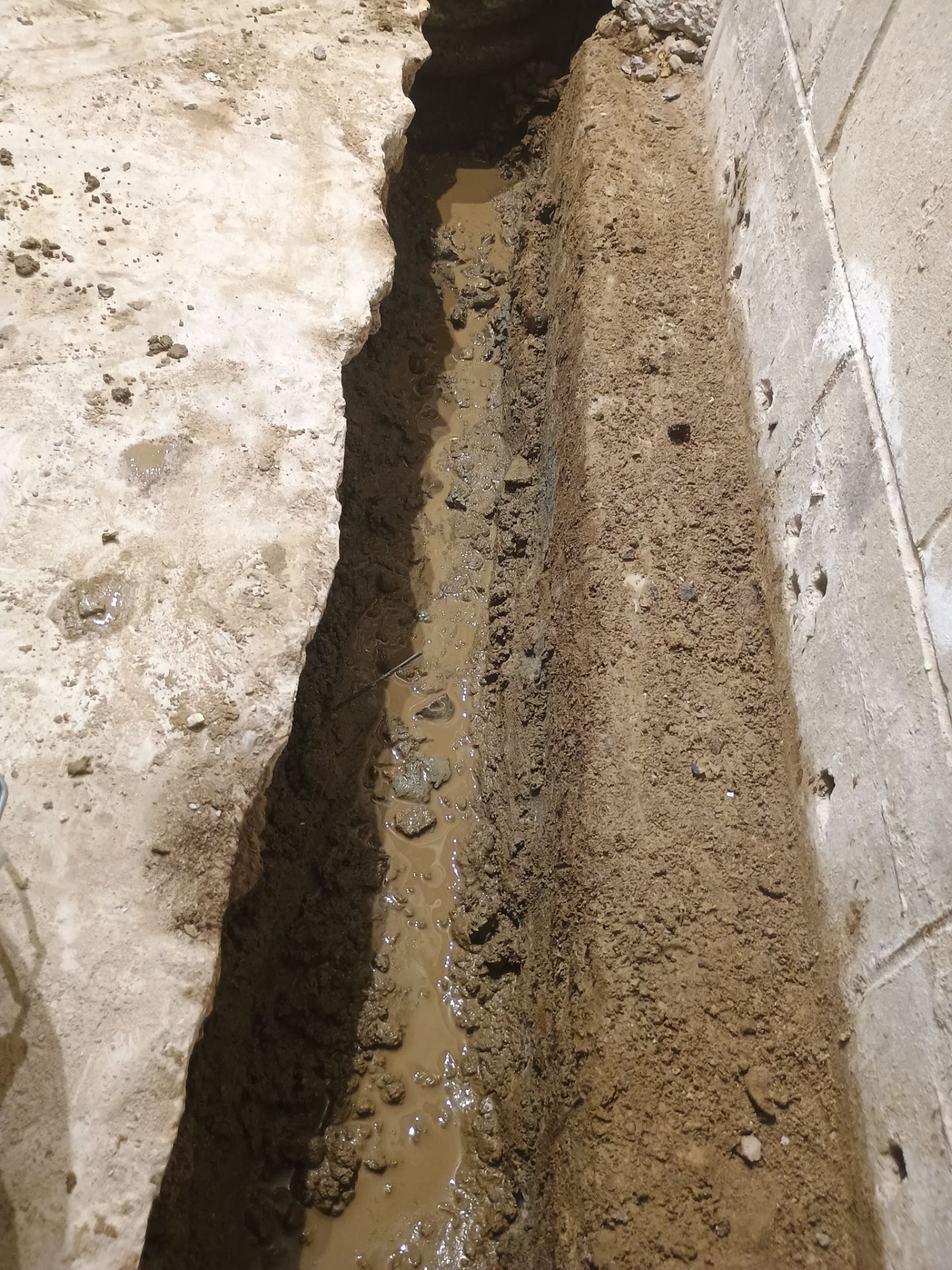 Interior Drain Tile Installation in Minnetonka, MN by Waterproofing Northeast