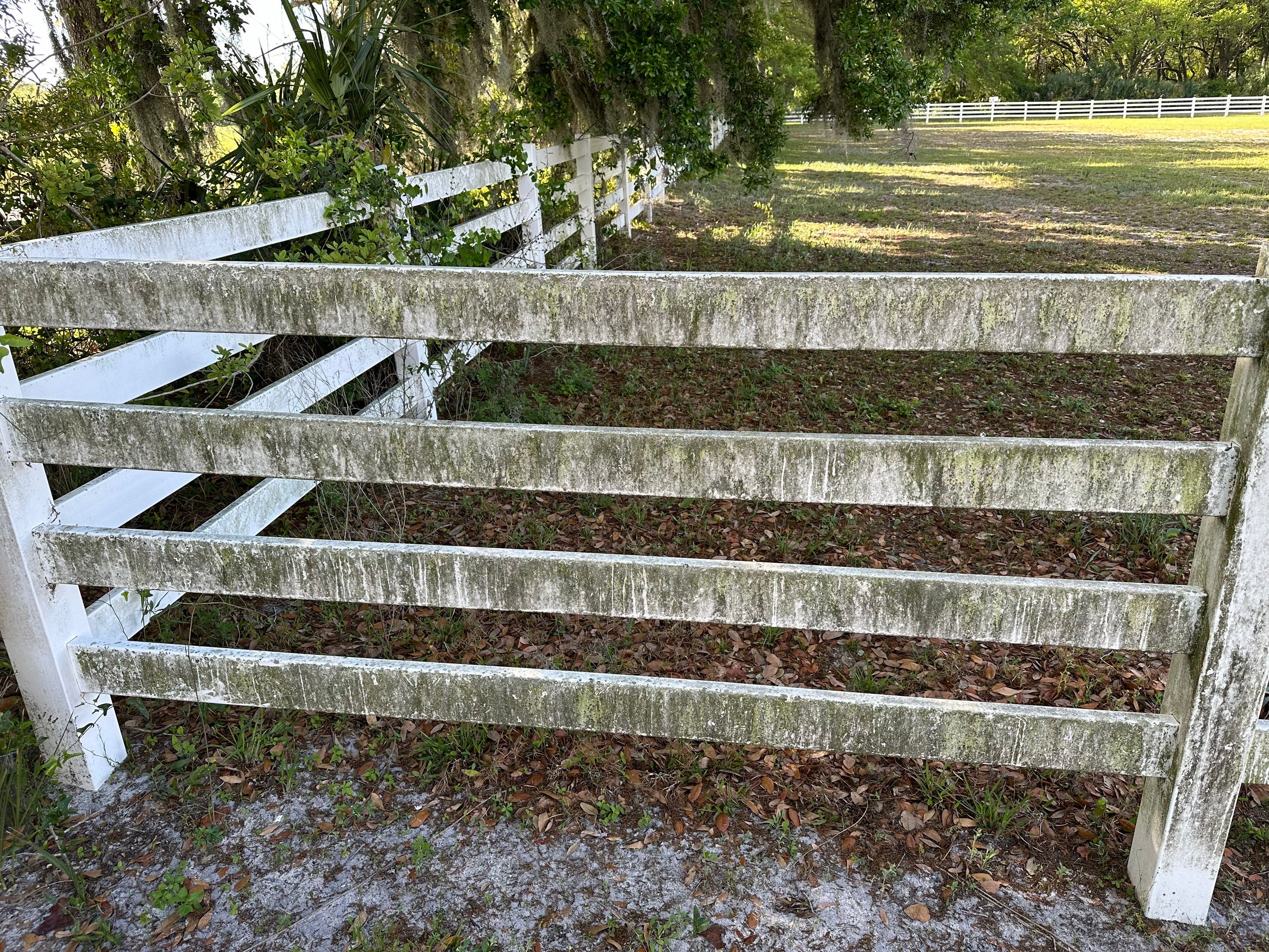 Vinyl Horse Fence & Concrete Pier Cleaning at Lesley Cox Equestrian, Parrish, FL | Sunshine AquaWash by Sunshine AquaWash