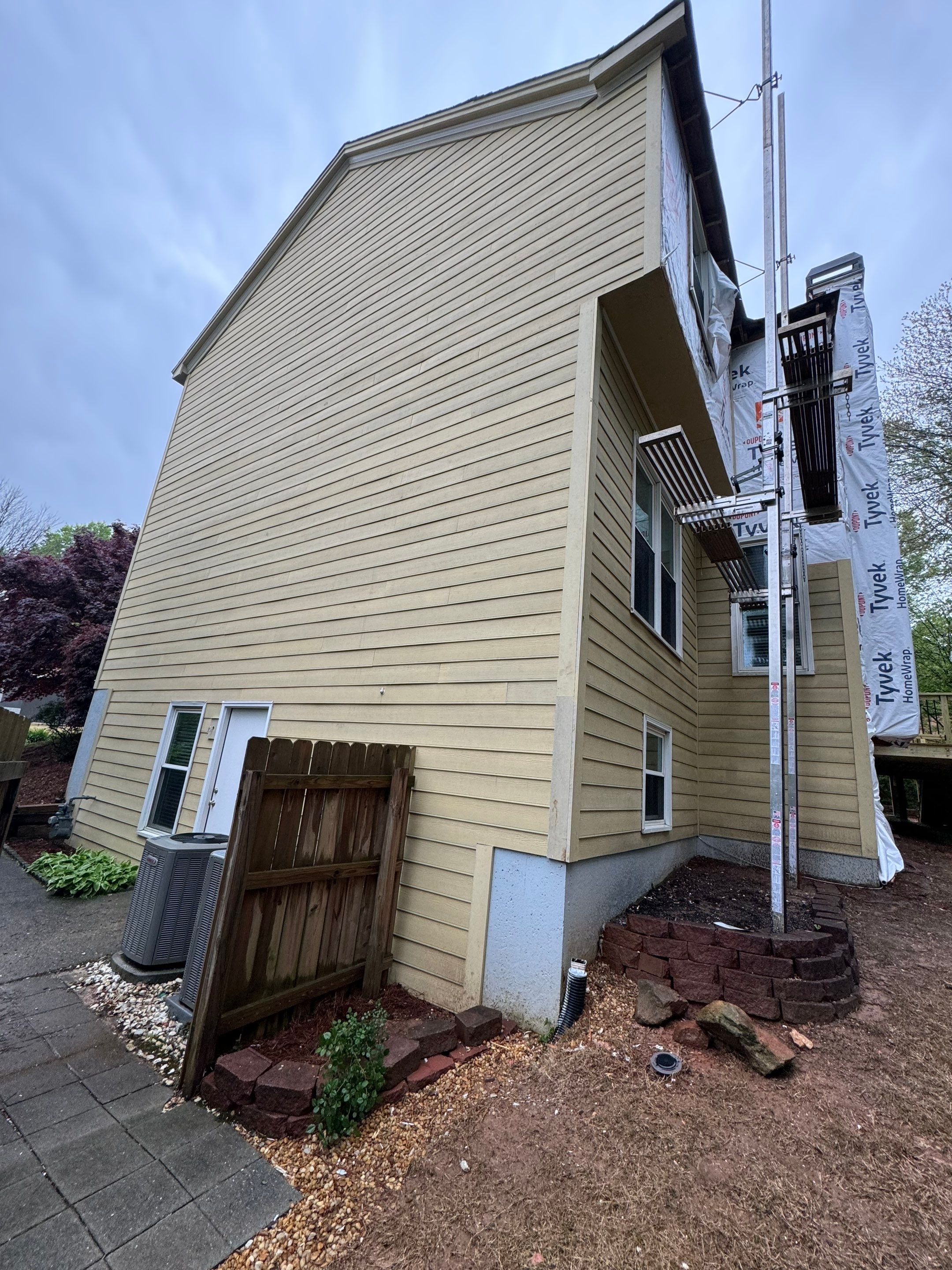 Full Exterior Siding Replacement and Custom Deck in Johns Creek by Swift Home Renovations 