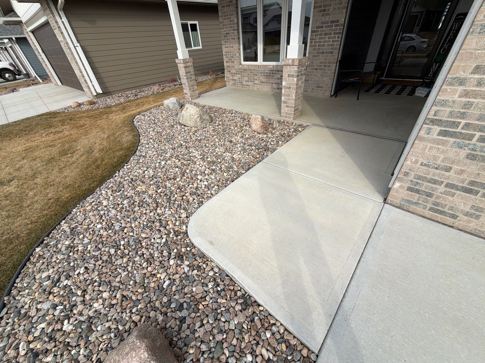 Decorative Flake Concrete Coating for Sioux Falls Porch and Patio by Select Painting, Coatings & Garage Cabinets