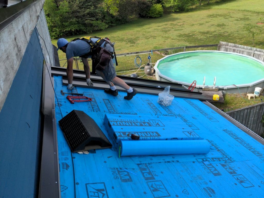 Residential Roofing Installation using 24 Ga Standing Seam Metal  by Jay Carter Roofing & Sheet Metal