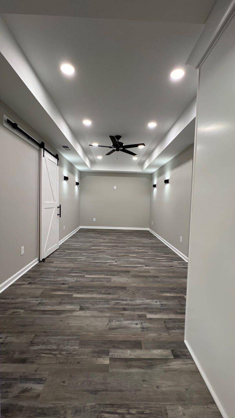 Modern Basement Finishing Project in Acworth Featuring Custom Wet Bar by Swift Home Renovations