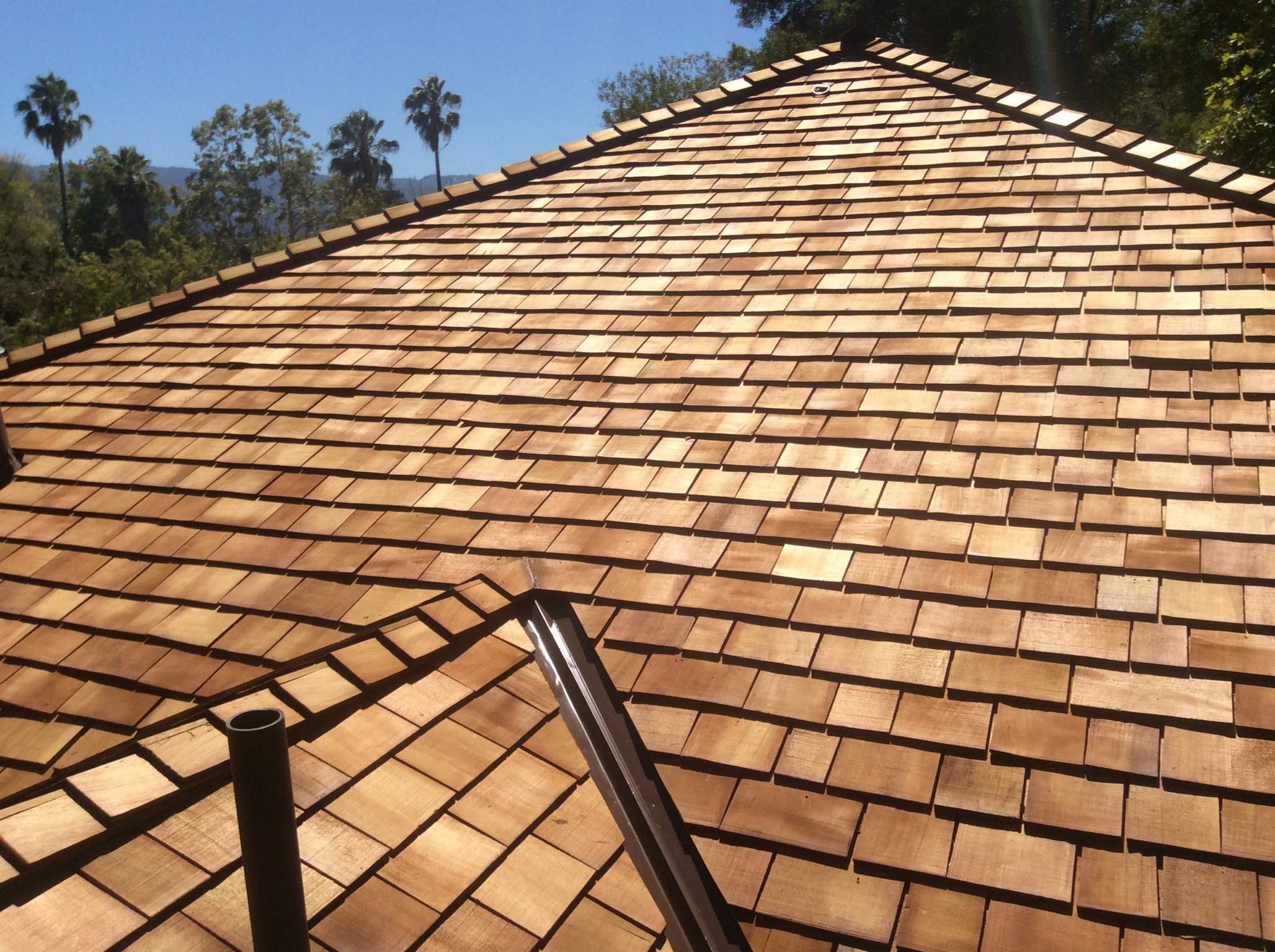 Custom Cedar Shake Roof Replacement for Saratoga Craftsman Home by Eastman Roofing & Waterproofing Inc.
