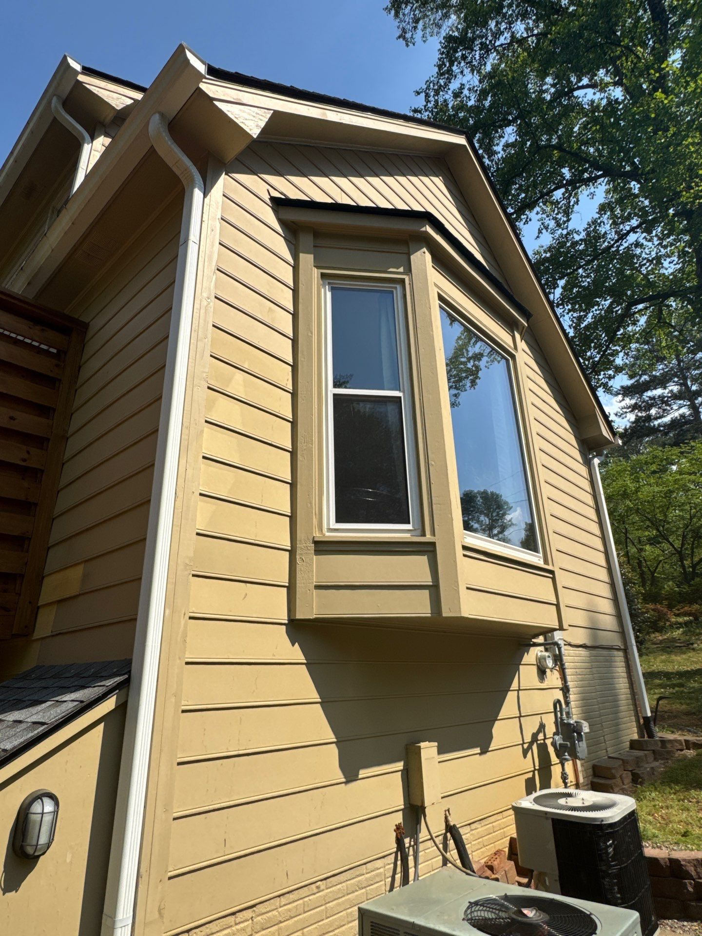 Siding Replacement and Exterior Painting using James Hardie Lap Siding and Sherwin Williams Paint by Nelson Exteriors 