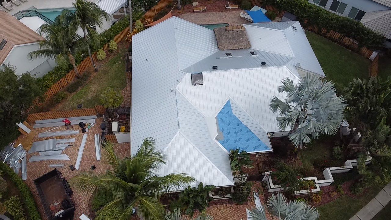 Residential Roofing Installation using 1" Nail strip metal roof by BLUES BROTHERS ROOFING
