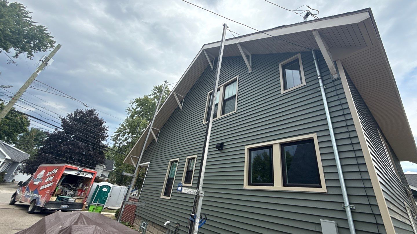 Siding Replacement using Alside Charter Oak D4.5" Deep Moss by 180 Contractors