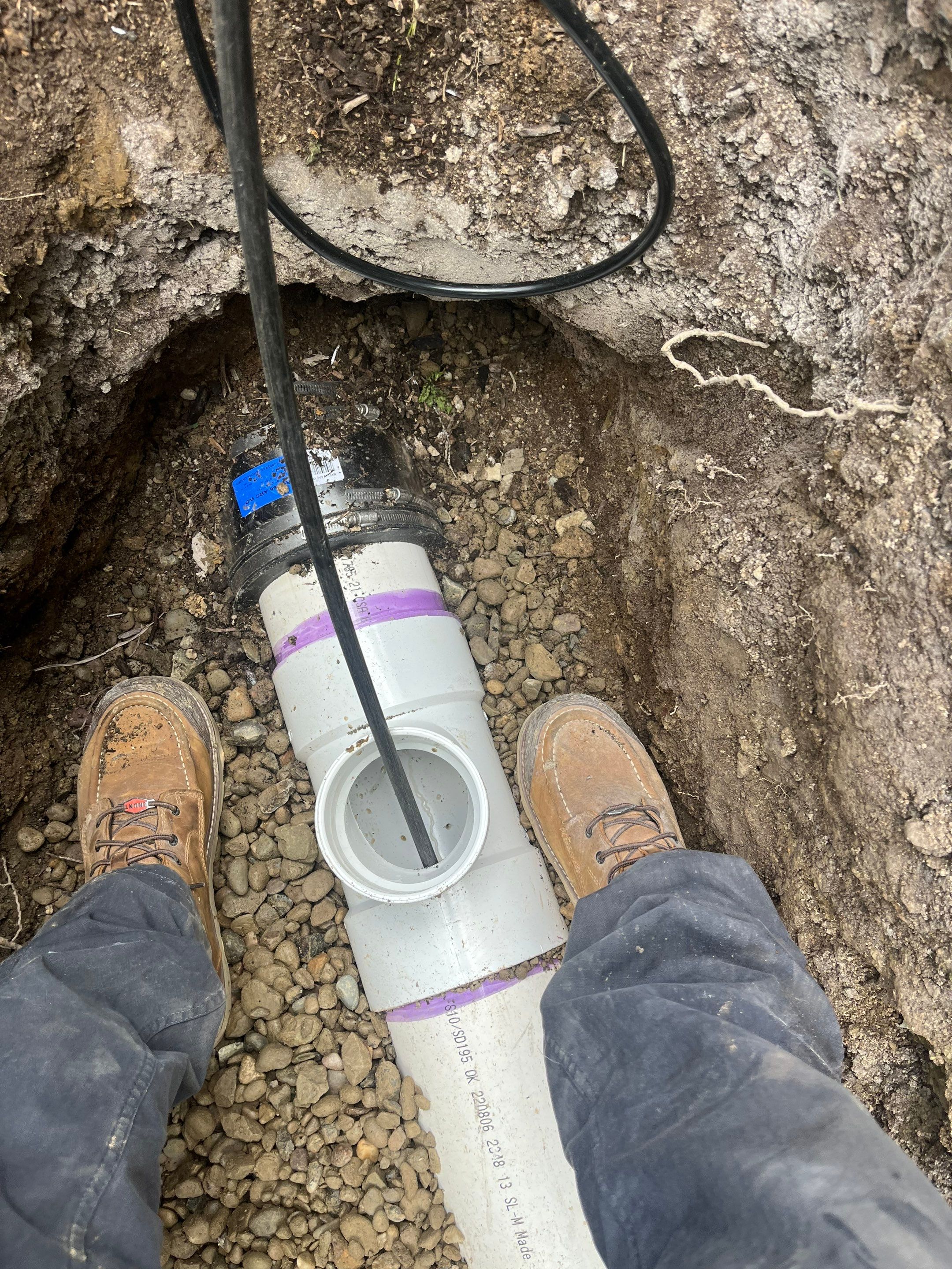 Adding Cleanout after House Trap using 2 Ton Excavator by Sureway Comfort John Wilcox Plumbing Heating Cooling