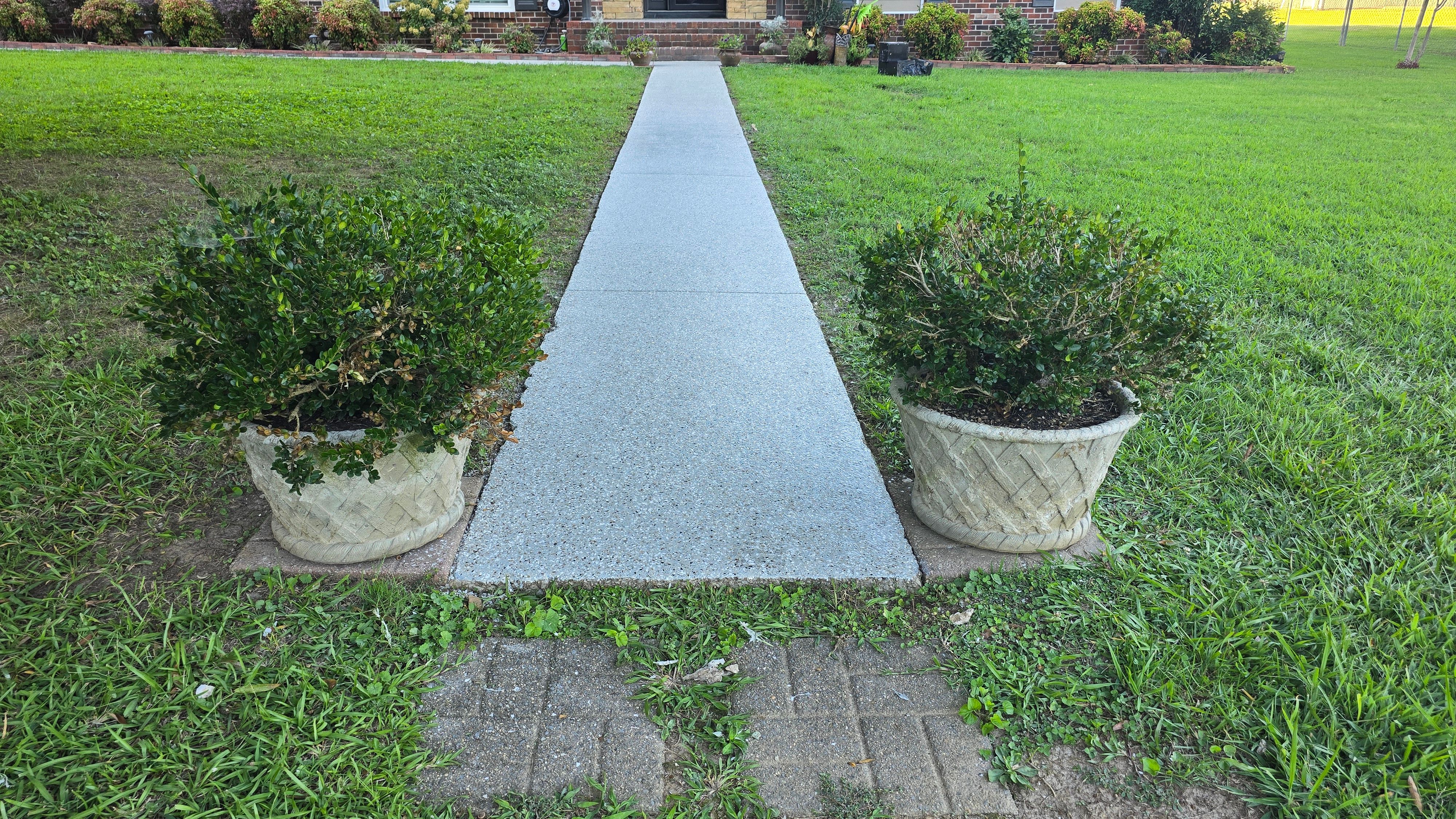 Driveway, Garage, Porch, and Sidewalk using Creekbed by Elite Floor Solutions