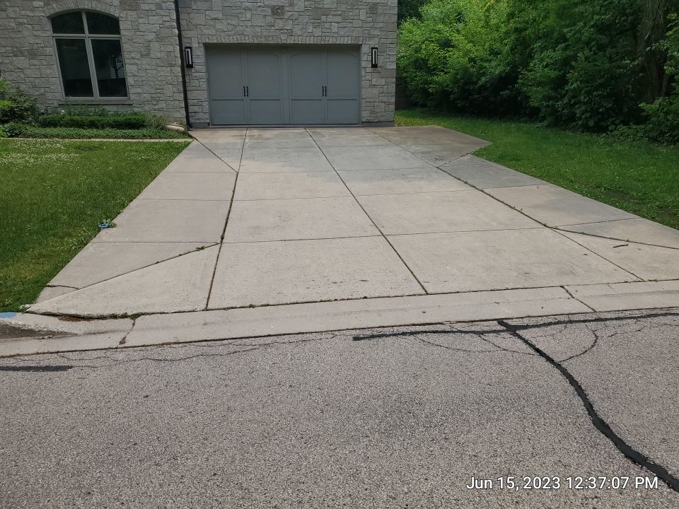 Highland Park, IL Bluestone, concrete,  Trex deck cleaning by Northern Power Washing LLC.