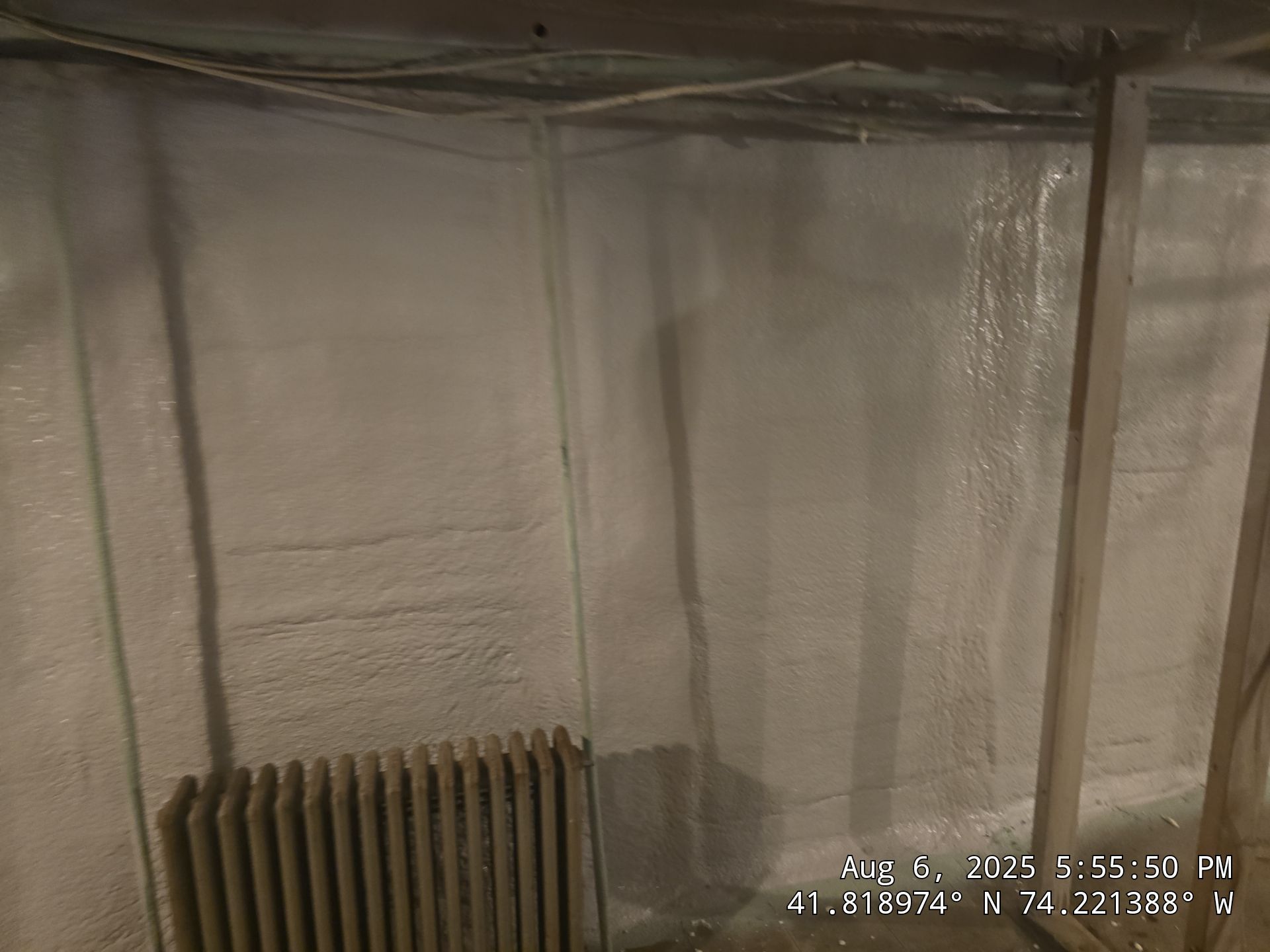 Master bedroom Exterior Walls using open cell spray foam by NYS Foam & Energy