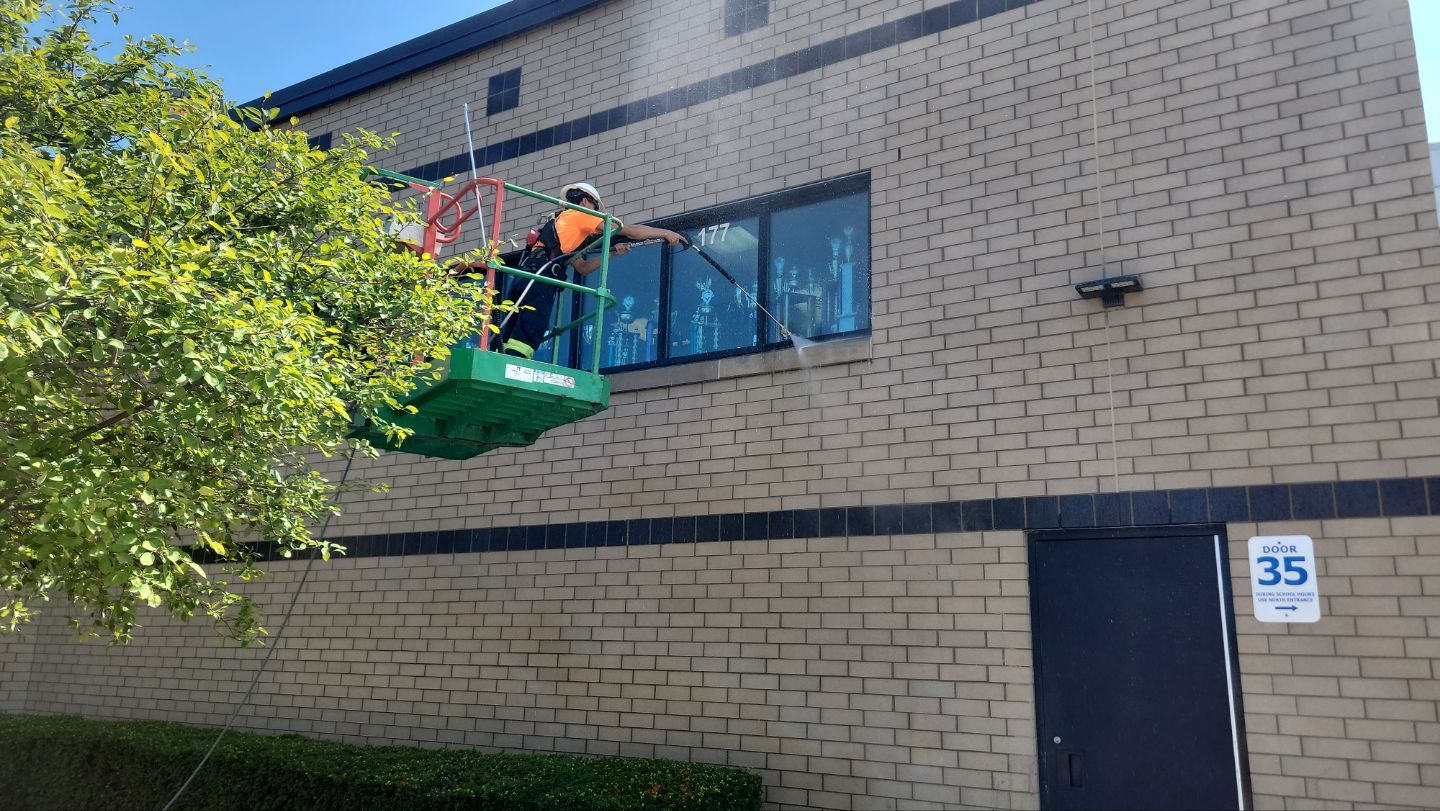 commercial pressure washing using Algaecide, soft wash soap by Northern Power Washing LLC.