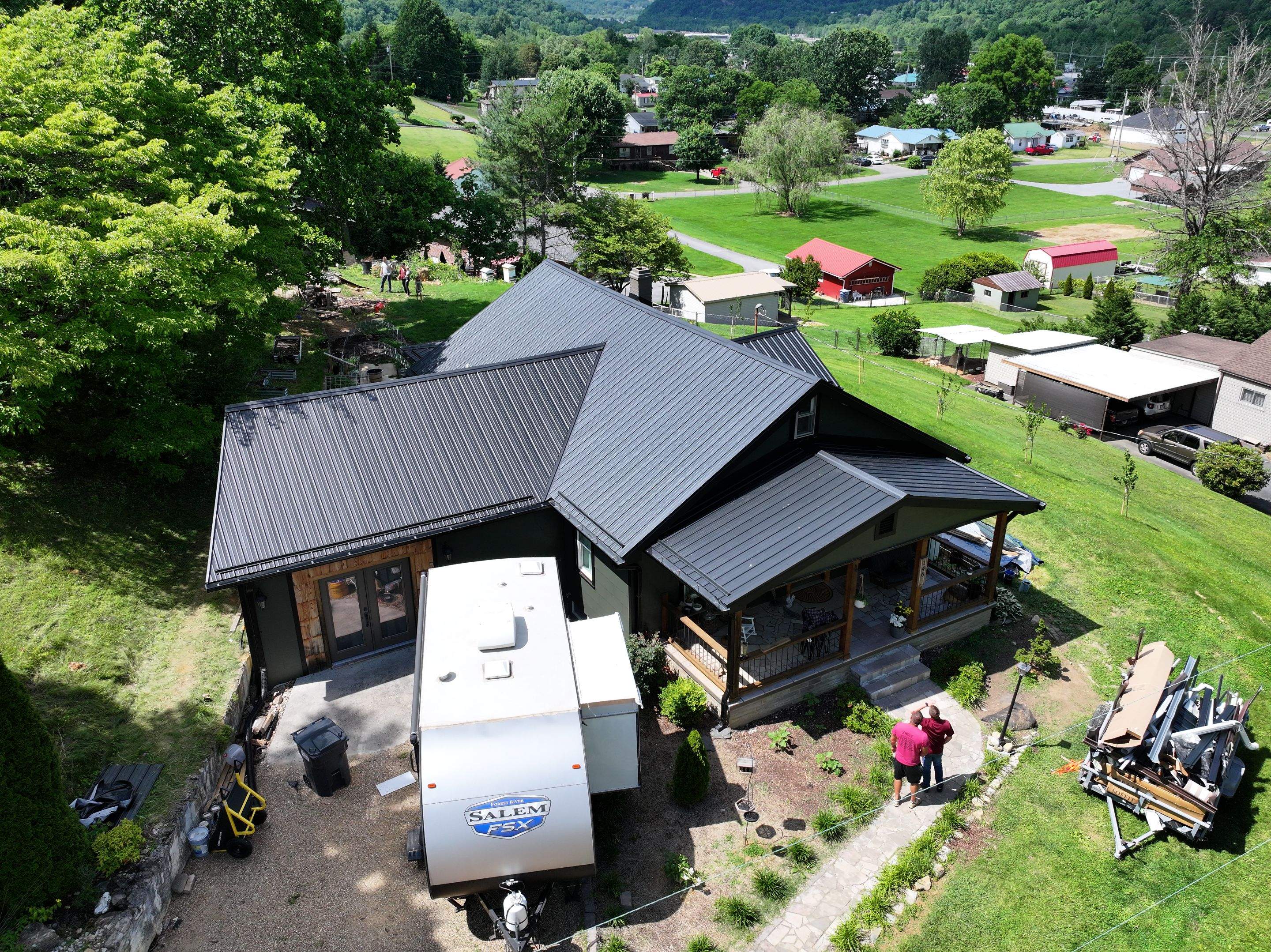 Textured Black Metal Roof by Omnia Roofing