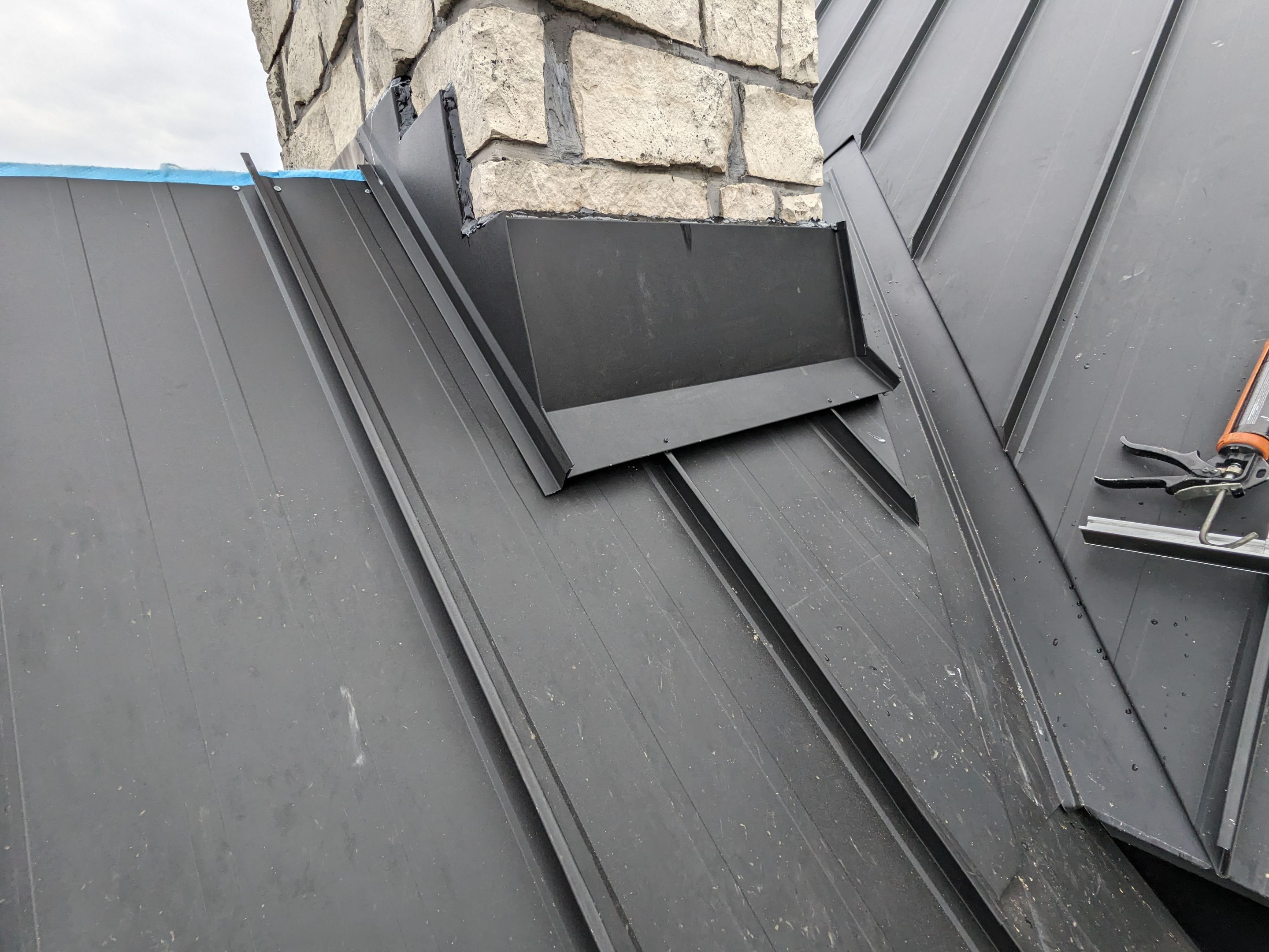 Residential Roofing Installation using 24 Ga Standing Seam Metal by Jay Carter Roofing & Sheet Metal