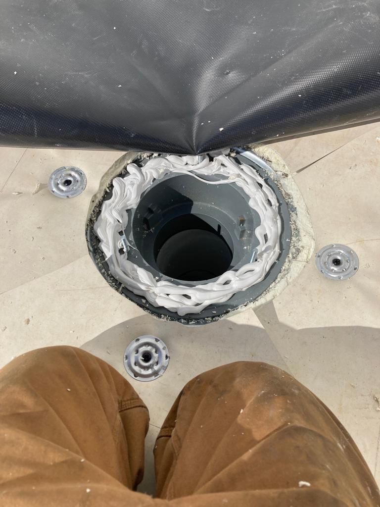 Drain Installation at CJ BIO by Grell Roofing, LLC
