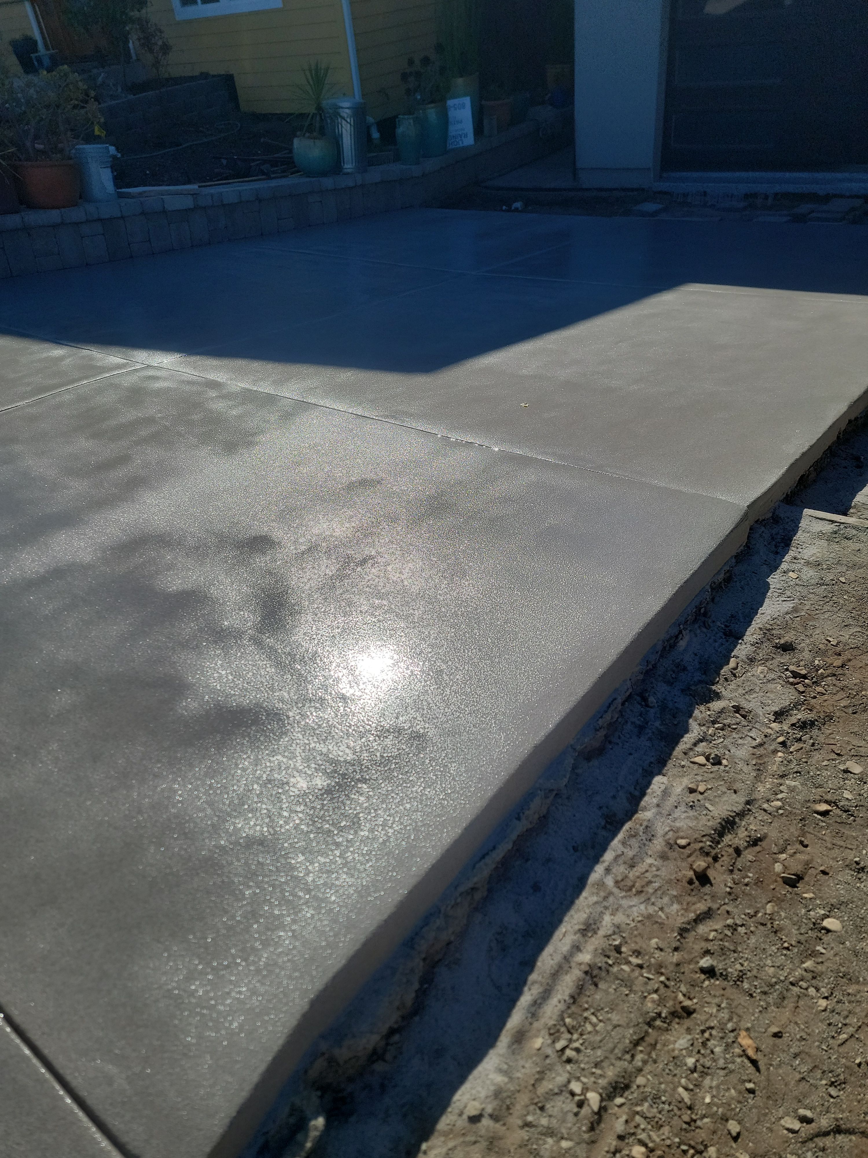 Stonewash Garage Floor Coating and Quartz Concrete Driveway in Morro Bay by MGP Coatings