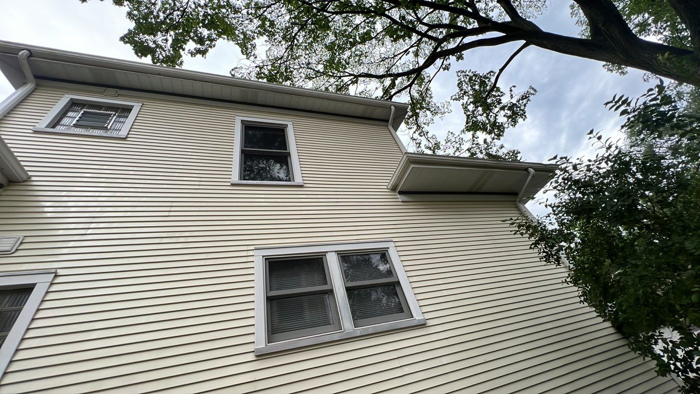 Housewashing  using Algaecide, soft wash soap by Northern Power Washing LLC.